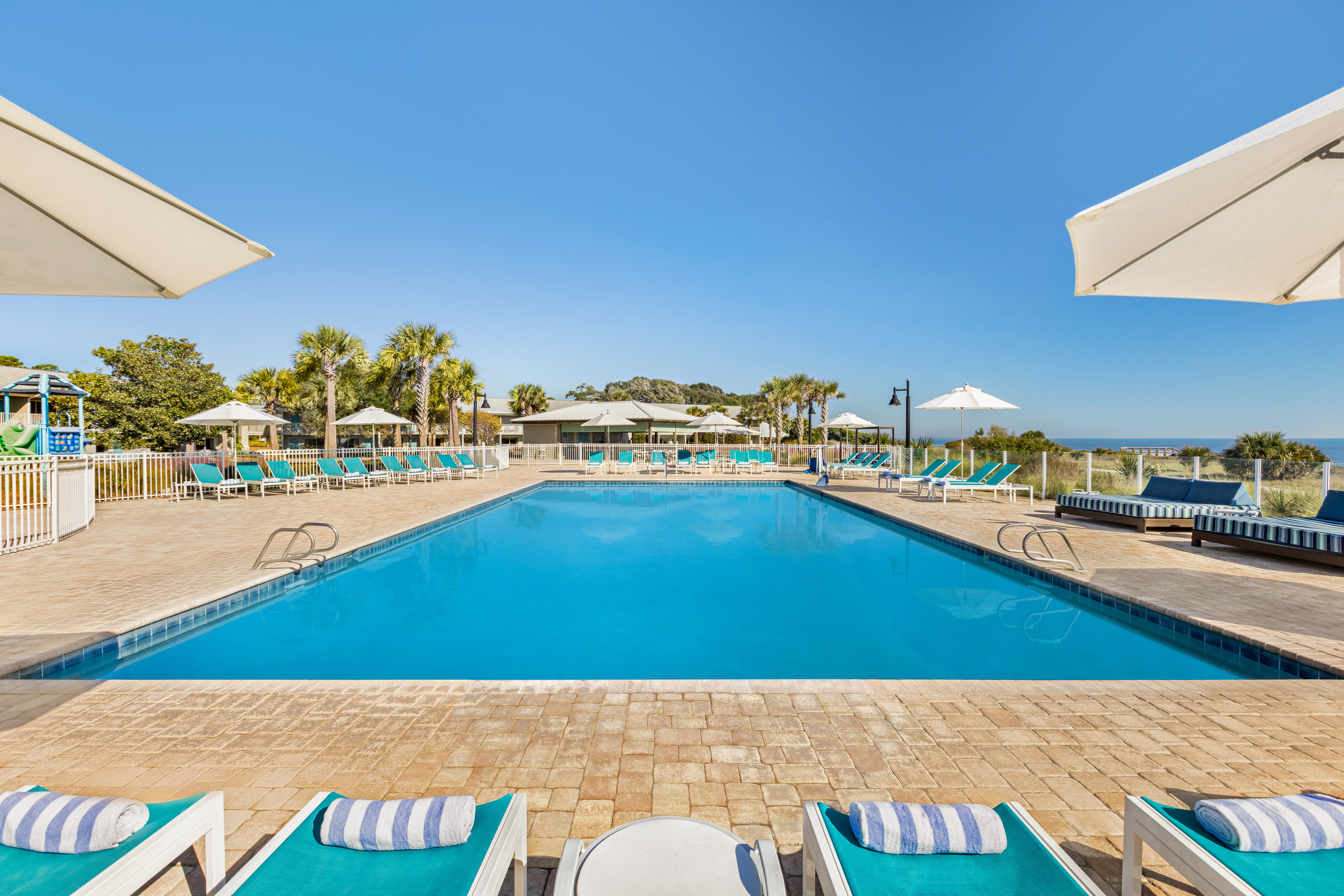 Take a dip in pool while taking in the picturesque ocean views