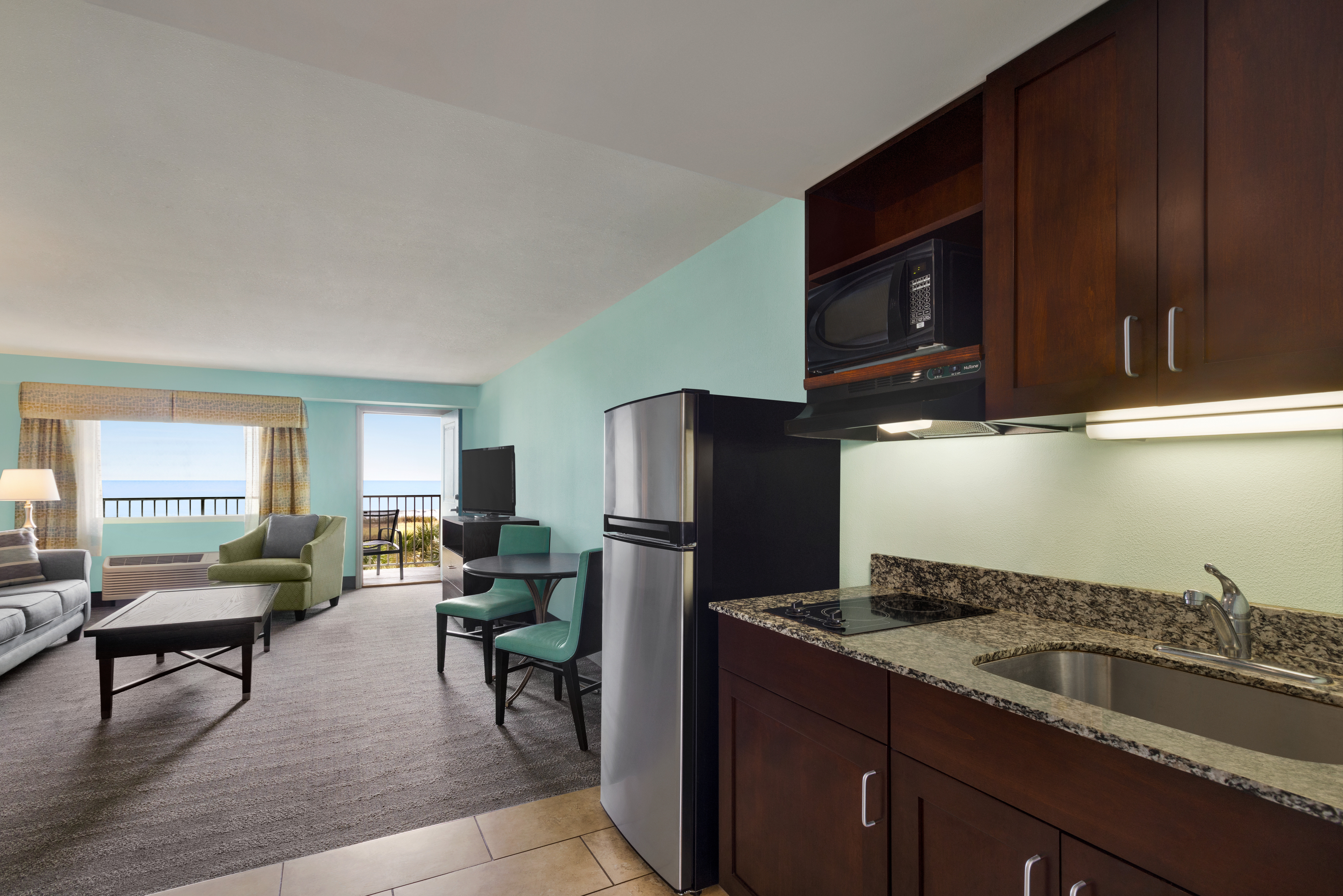Enjoy the ocean views from your kitchenette in our suites!