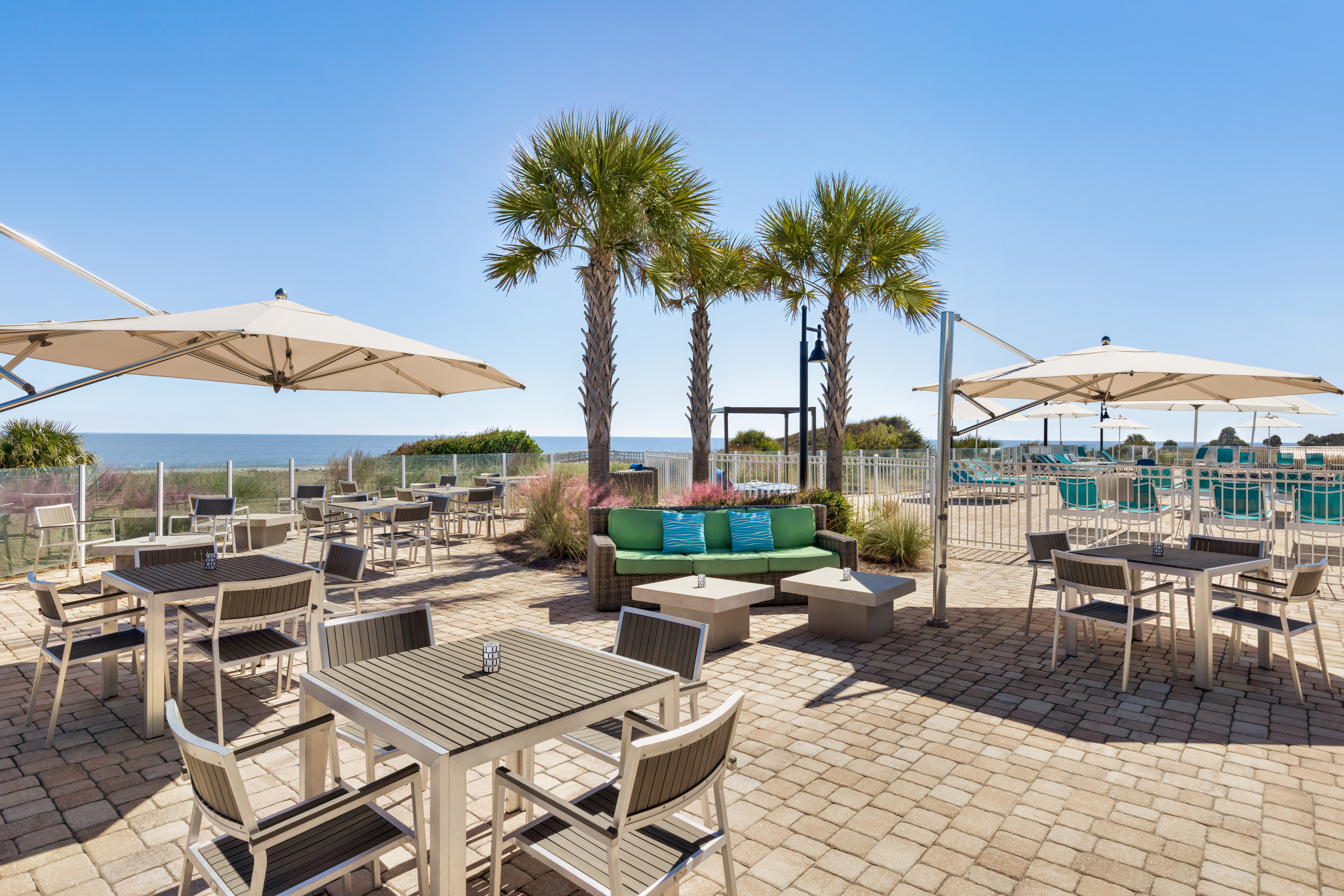 Enjoy poolside dining with ocean views at The Anchor