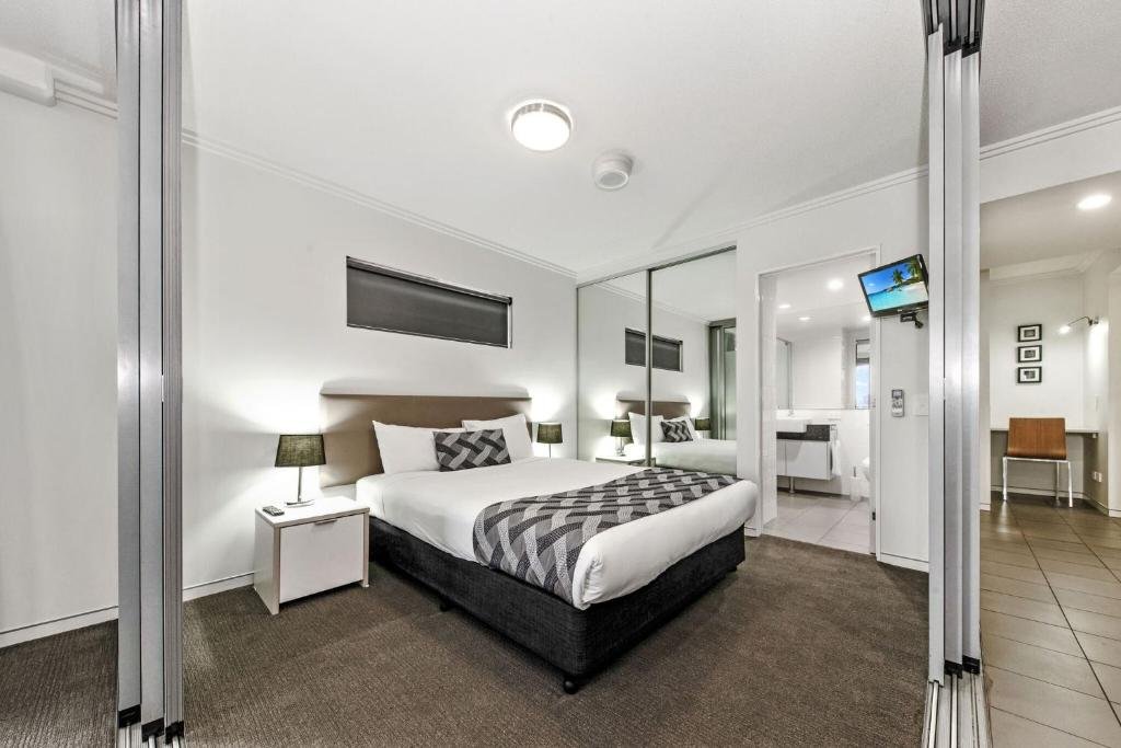 The Capitol Apartments-guestroom-Bedroom Bed Area.jpg