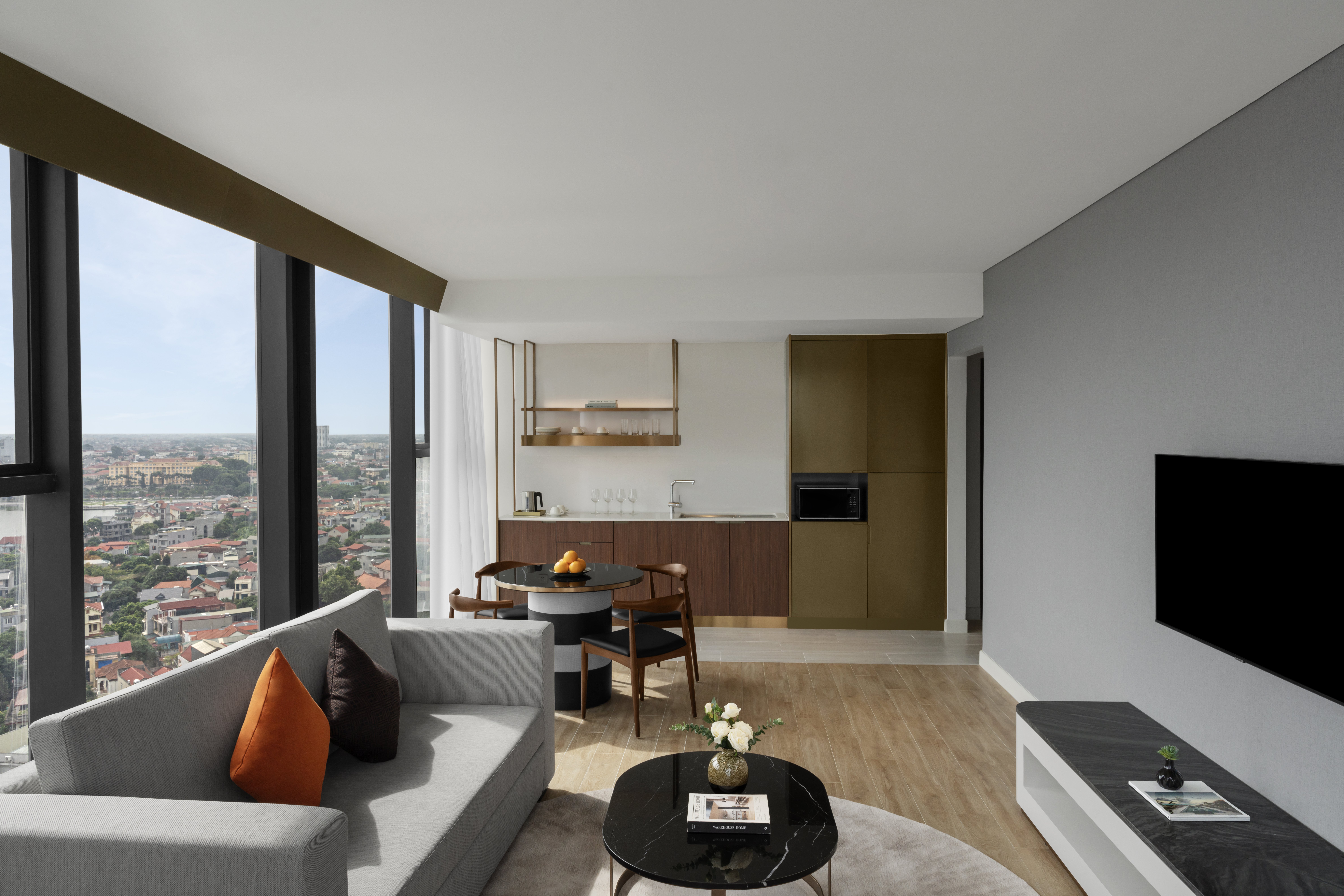 CROWNE PLAZA VINH YEN CITY CENTRE B-guestroom-Club Residence Suite featuring a living room and dining area.jpg