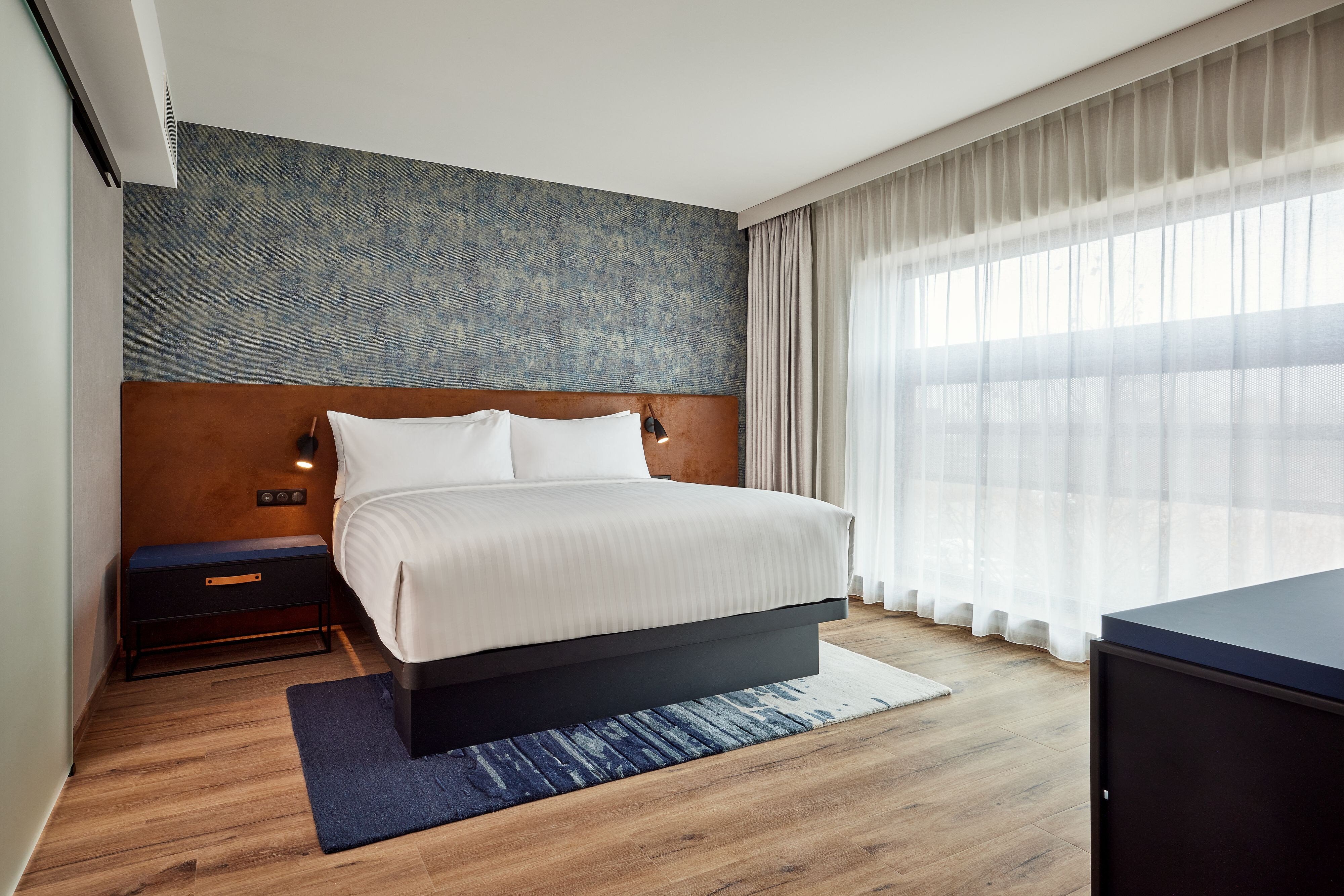 Residence Inn by Marriott Strasbourg-guestroom-King Suite Bedroom.jpg