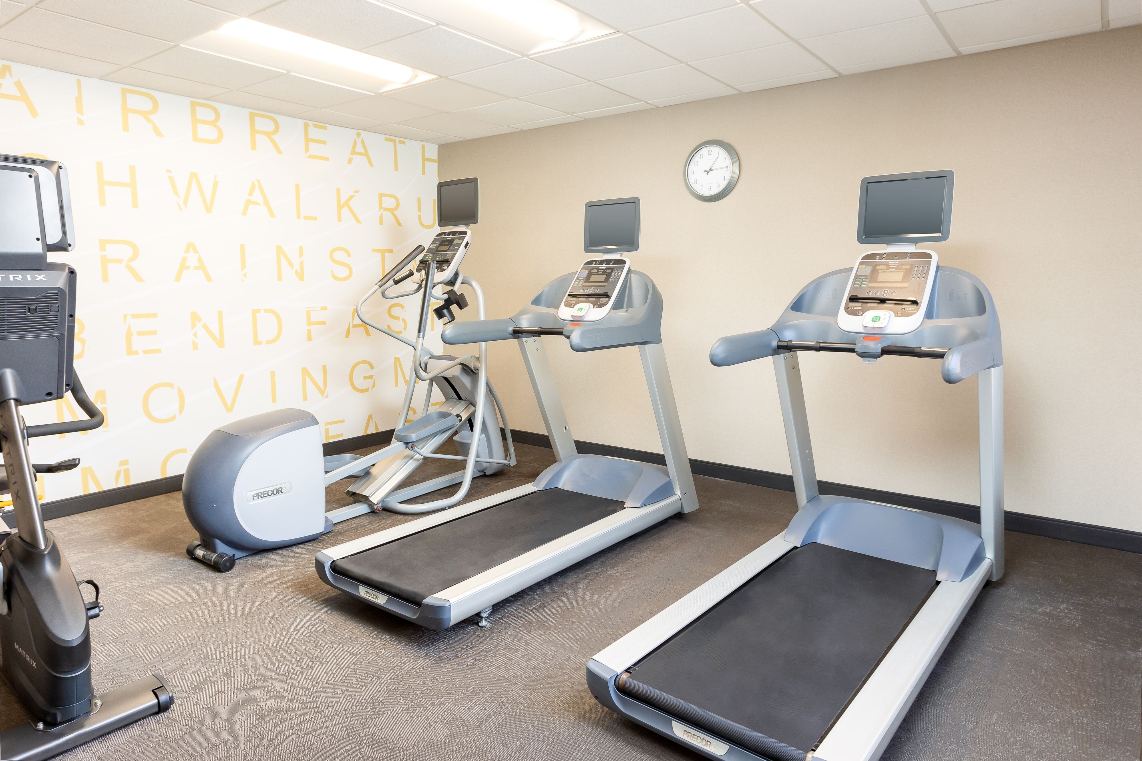 cardio machines in fitness room