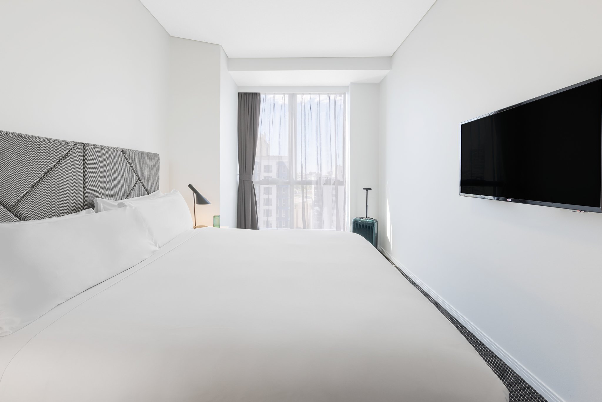 Meriton Suites Herschel Street-guestroom-Standard Suite.jpg