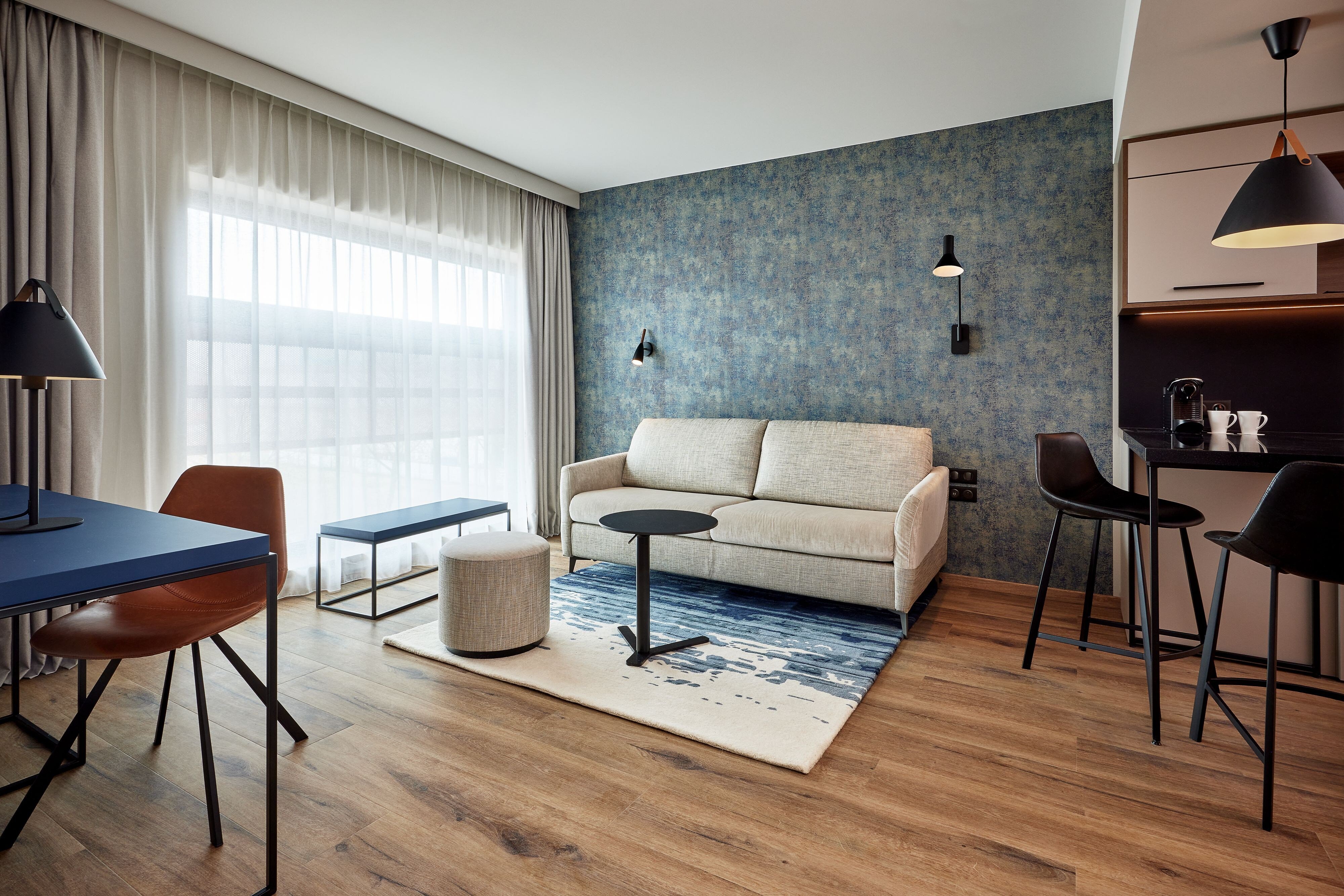 Residence Inn by Marriott Strasbourg-guestroom-Suite - Living Room.jpg