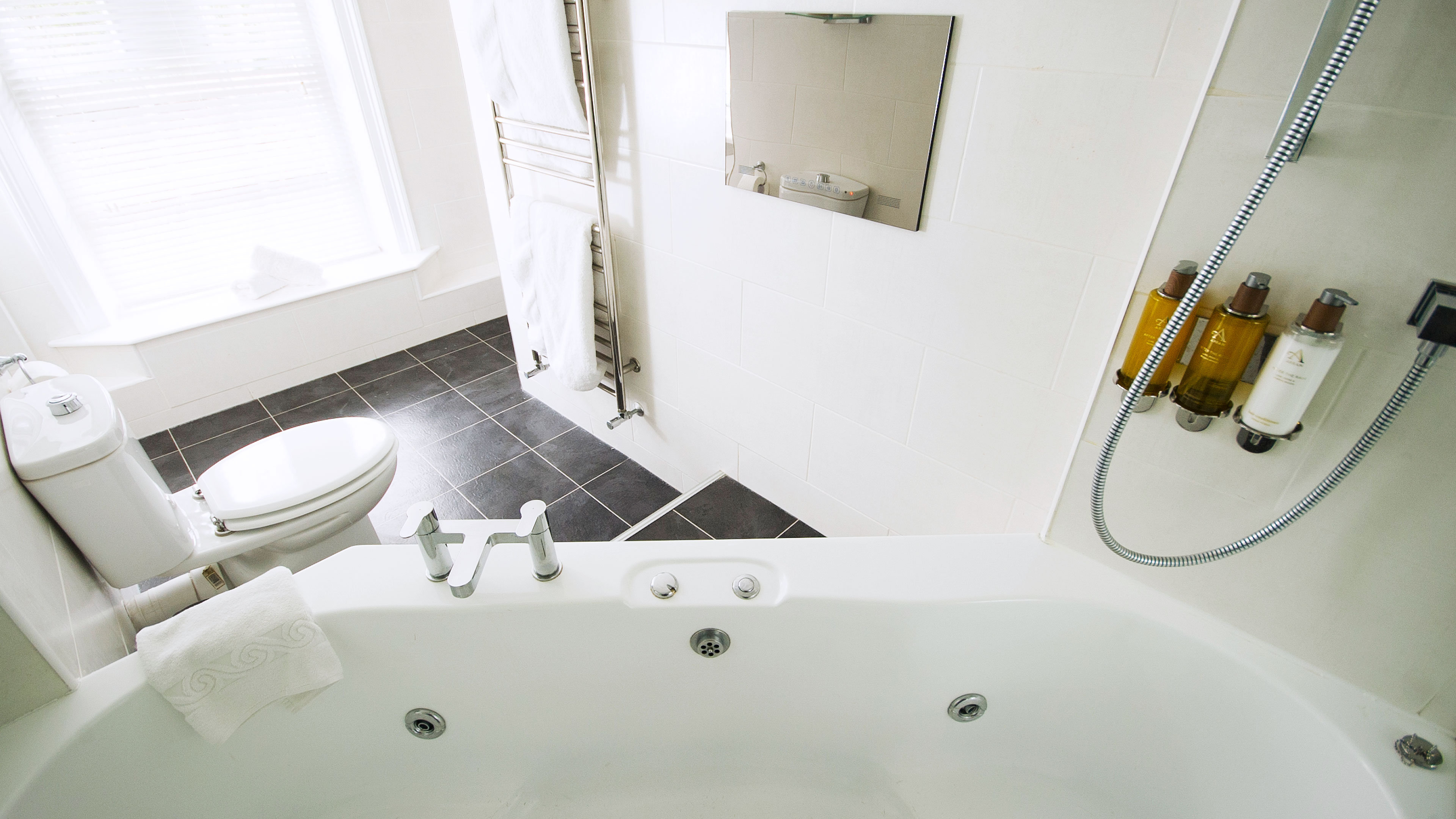 CROWN HOTEL WETHERAL-guestroom-Suite Bathroom.jpg