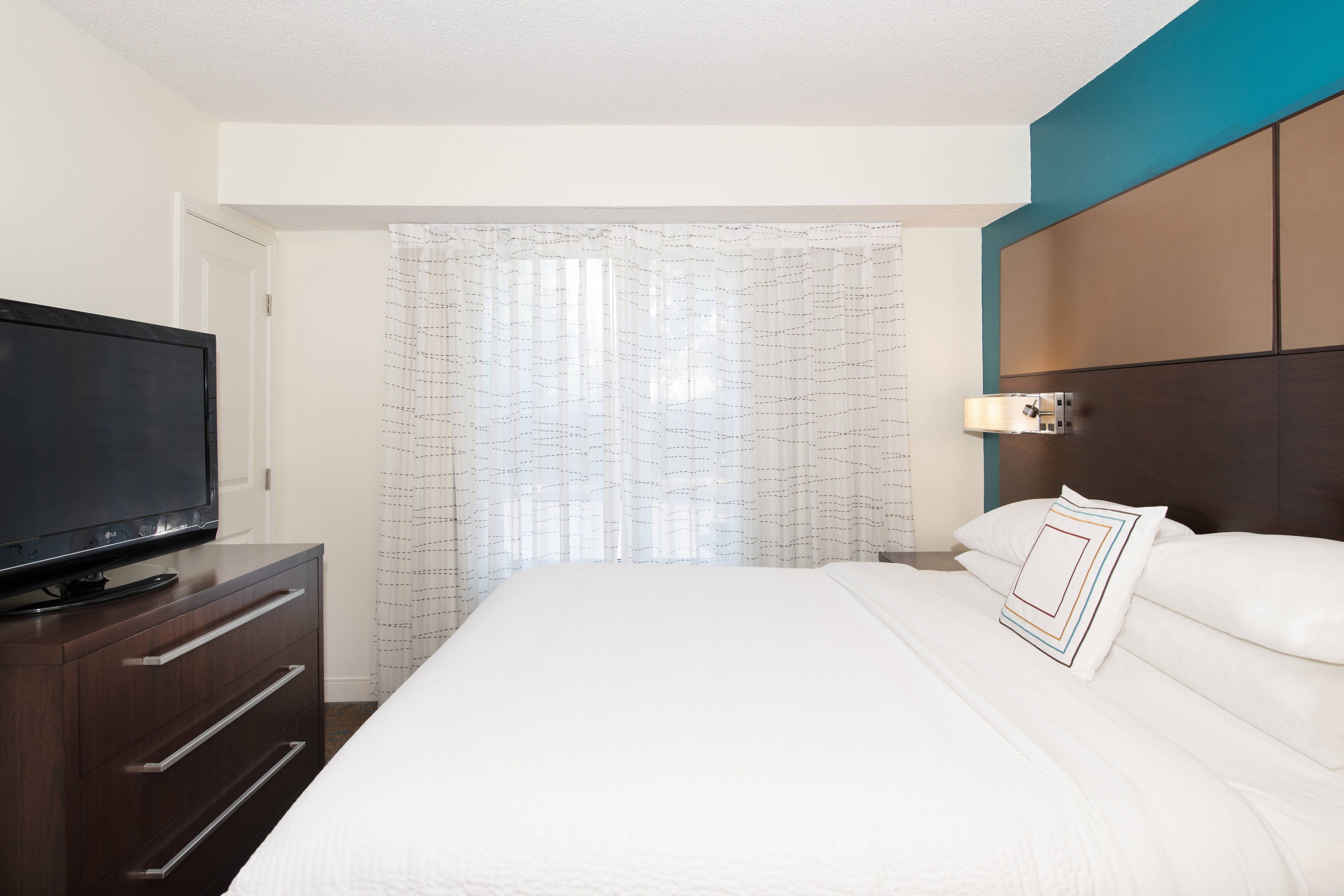 Residence Inn by Marriott Jacksonville Butler Boulevard-guestroom-One-Bedroom Suite - Bedroom.jpg