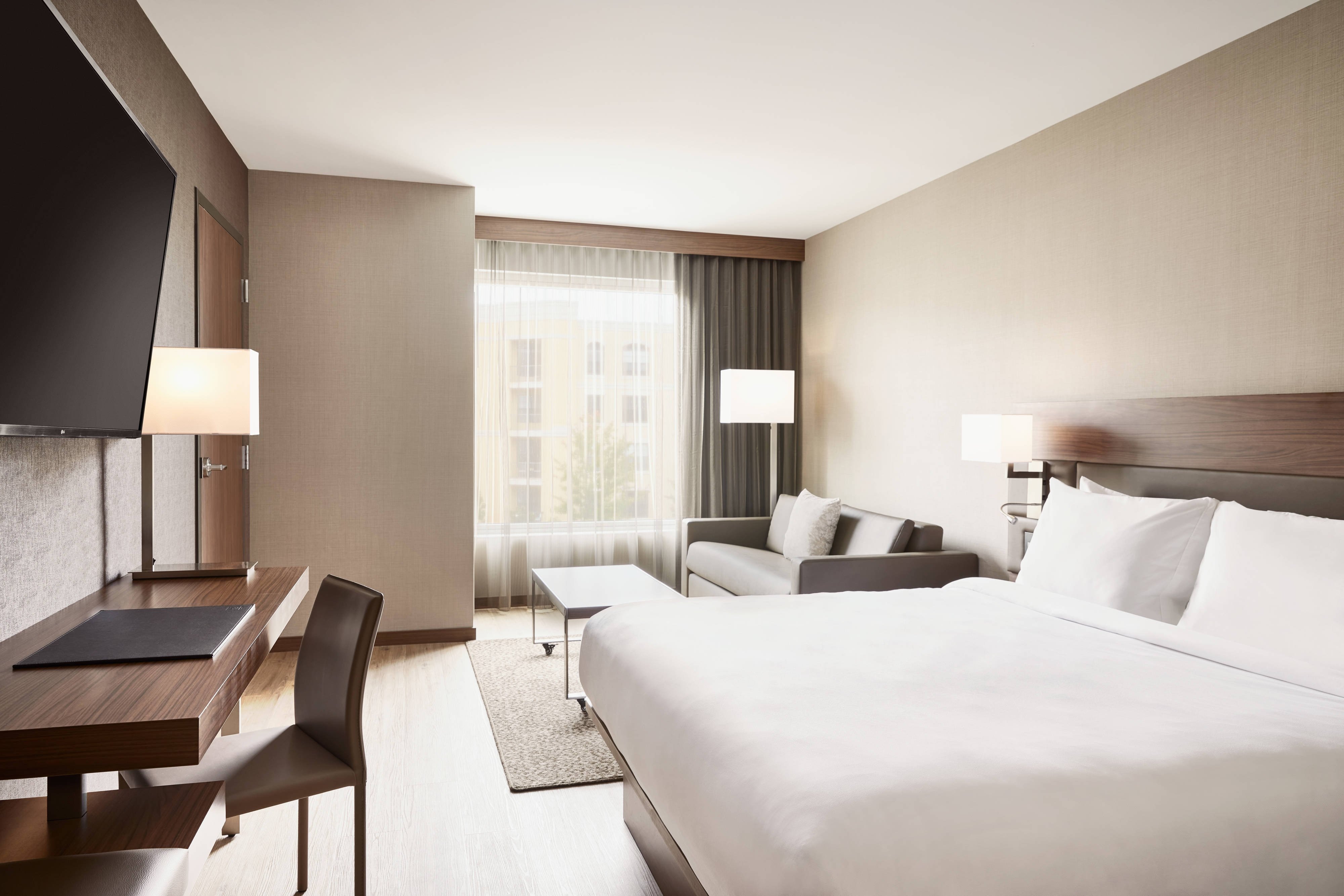 AC Hotels by Marriott Atlanta Perimeter-guestroom-King Guest Room with Sofa Bed.jpg