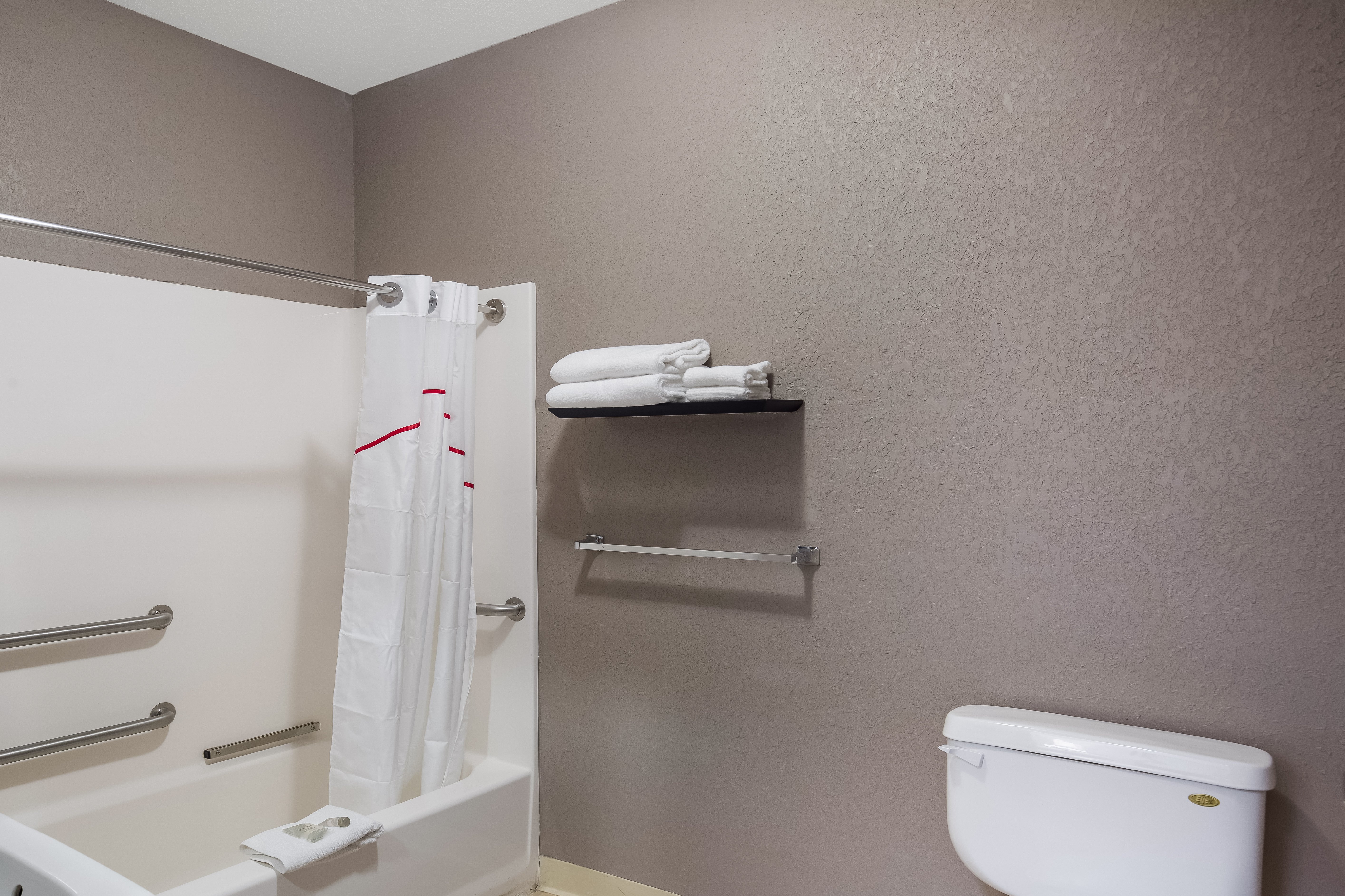 RED ROOF INN AND SUITES BLOOMSBURG-guestroom-ADA Bath.jpg
