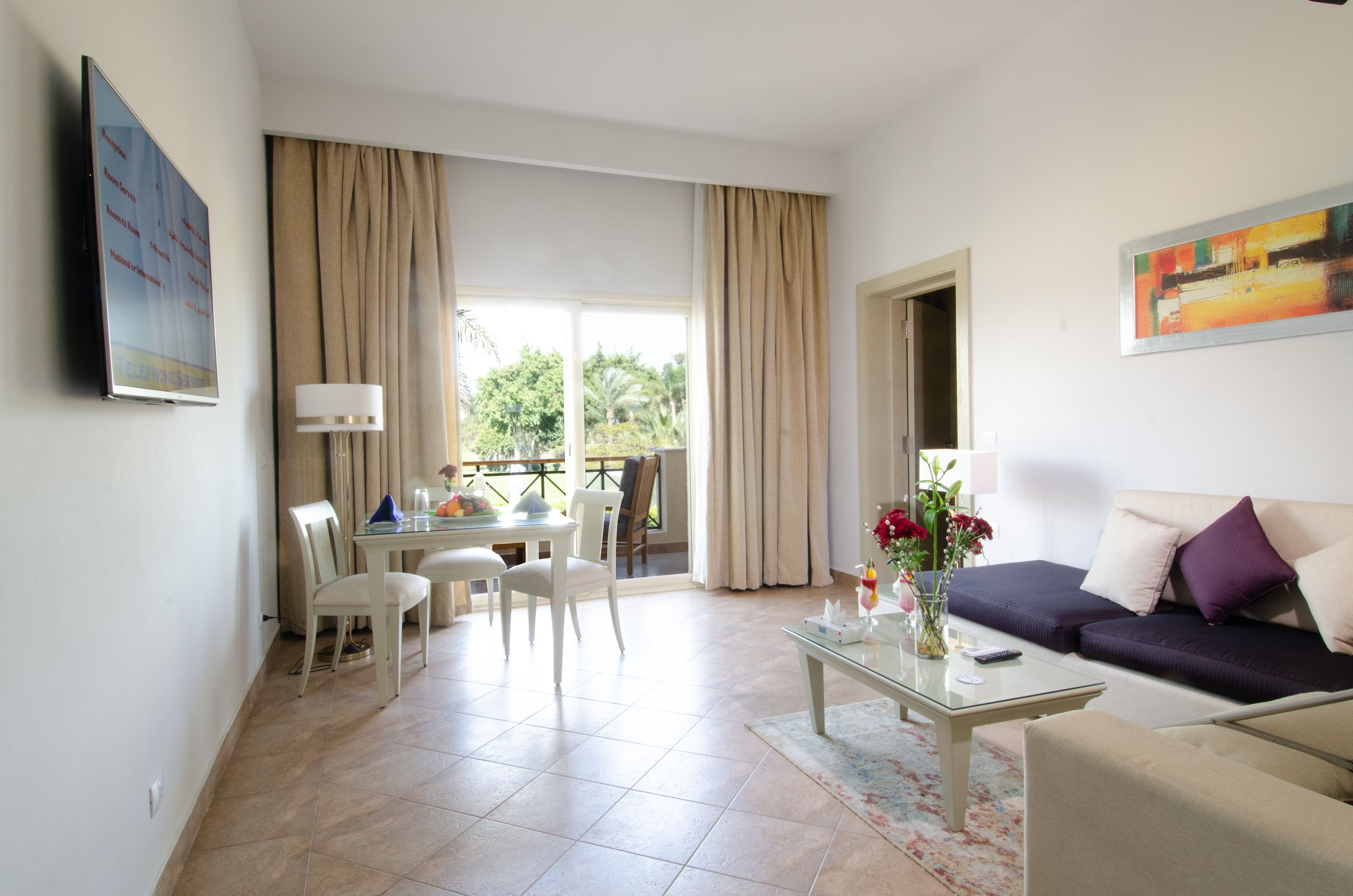 SWISS INN PYRAMIDS GOLF RESORT-guestroom-Junior Suite.jpg