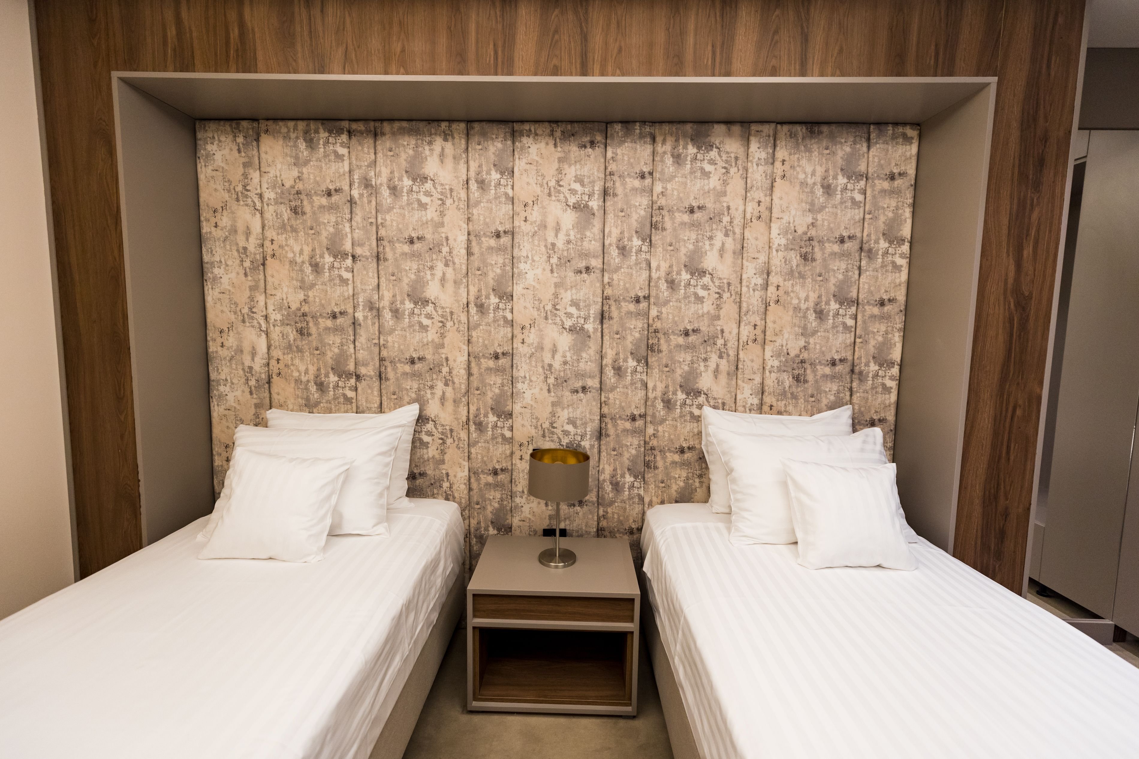 STEIN COLLECTION HOTEL-guestroom-BUSINESS TWIN.jpg