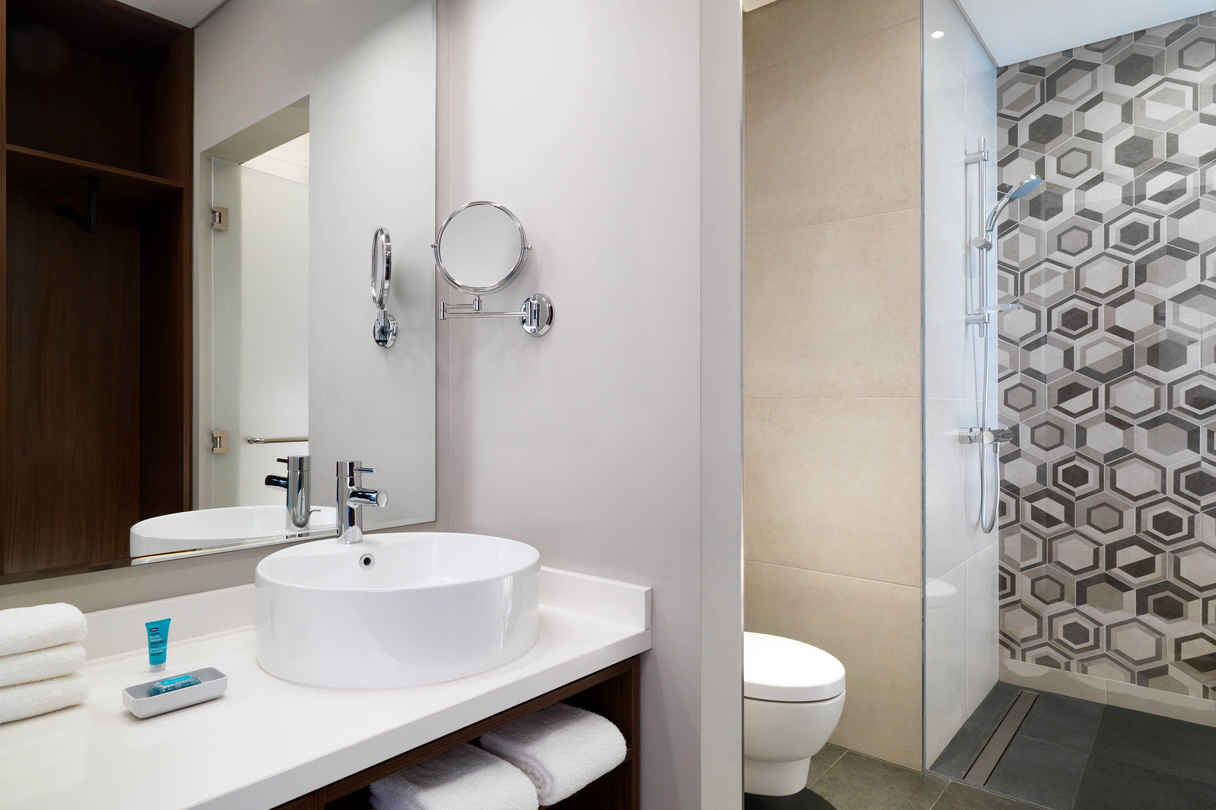 Aloft Meaisam Dubai-guestroom-Guest Bathroom – Walk-In Shower.jpg
