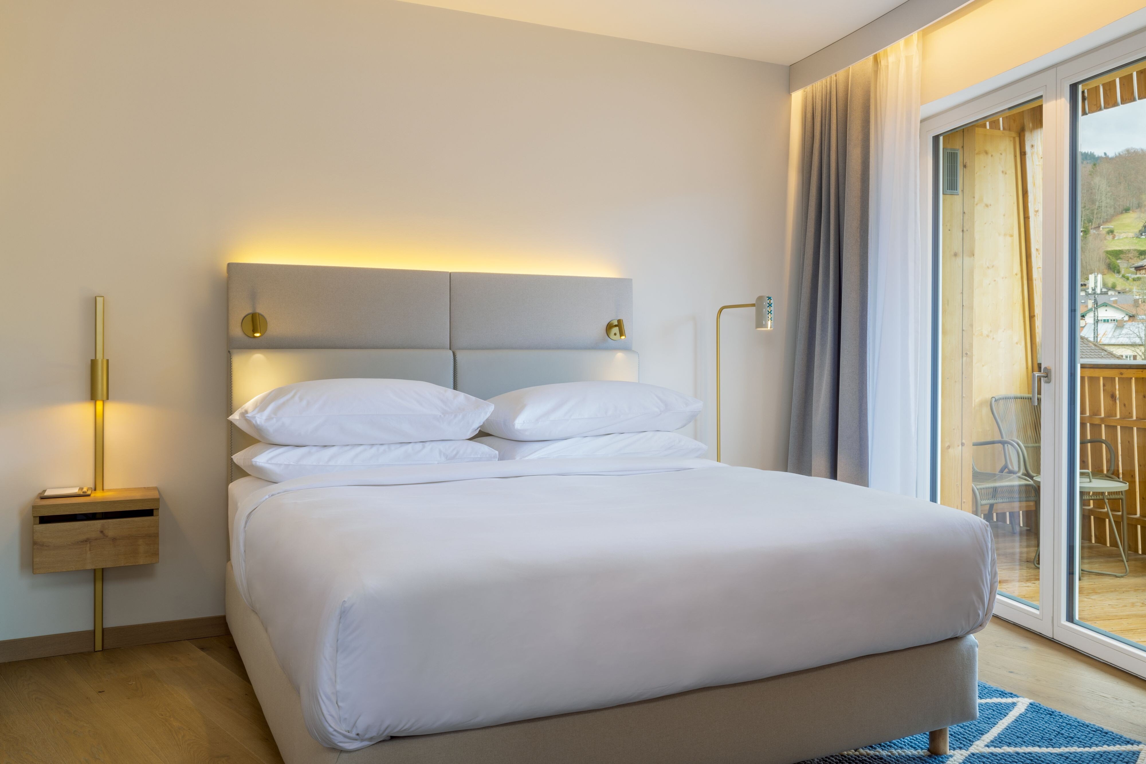 Caro and Selig Tegernsee Autograph Collection-guestroom-Caro Suite King bedroom.jpg