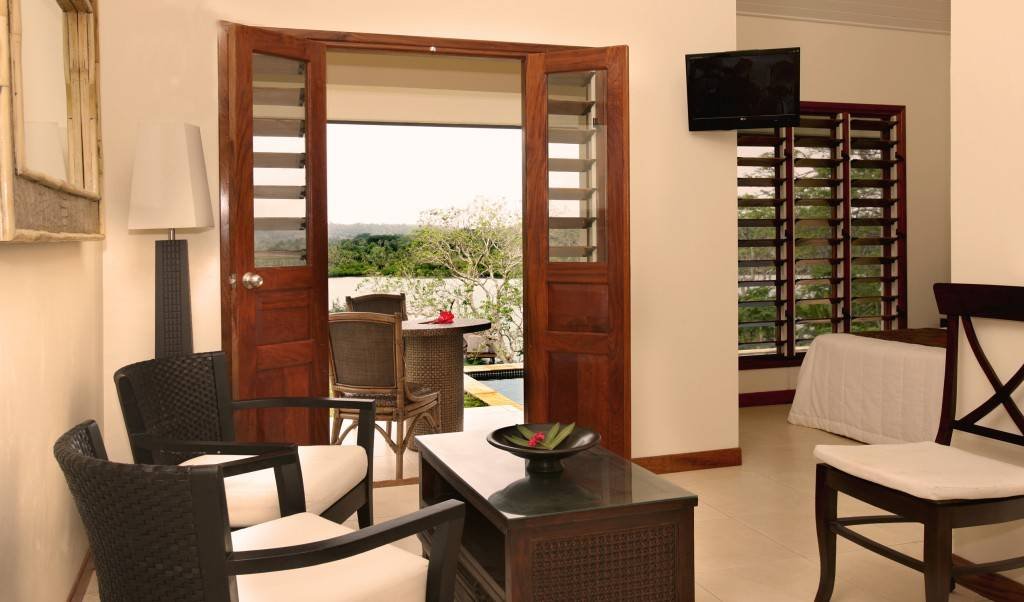 MANGOES RESORT AND RESTAURANT-guestroom-Lagoon Pool Bungalow Living Area.jpg