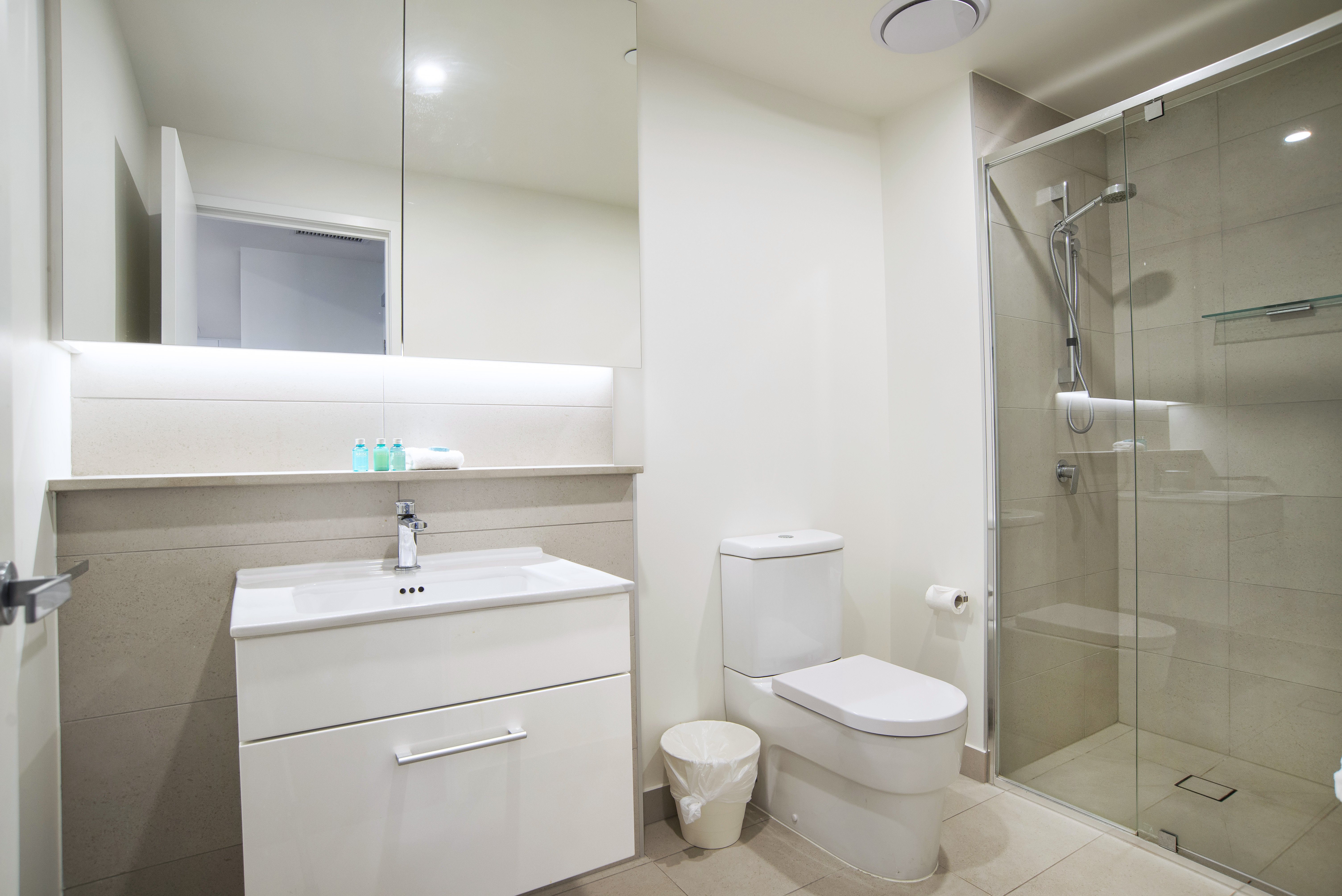 Atlas Apartments by CLLIX-guestroom-1 Bedroom-Bathroom.jpg