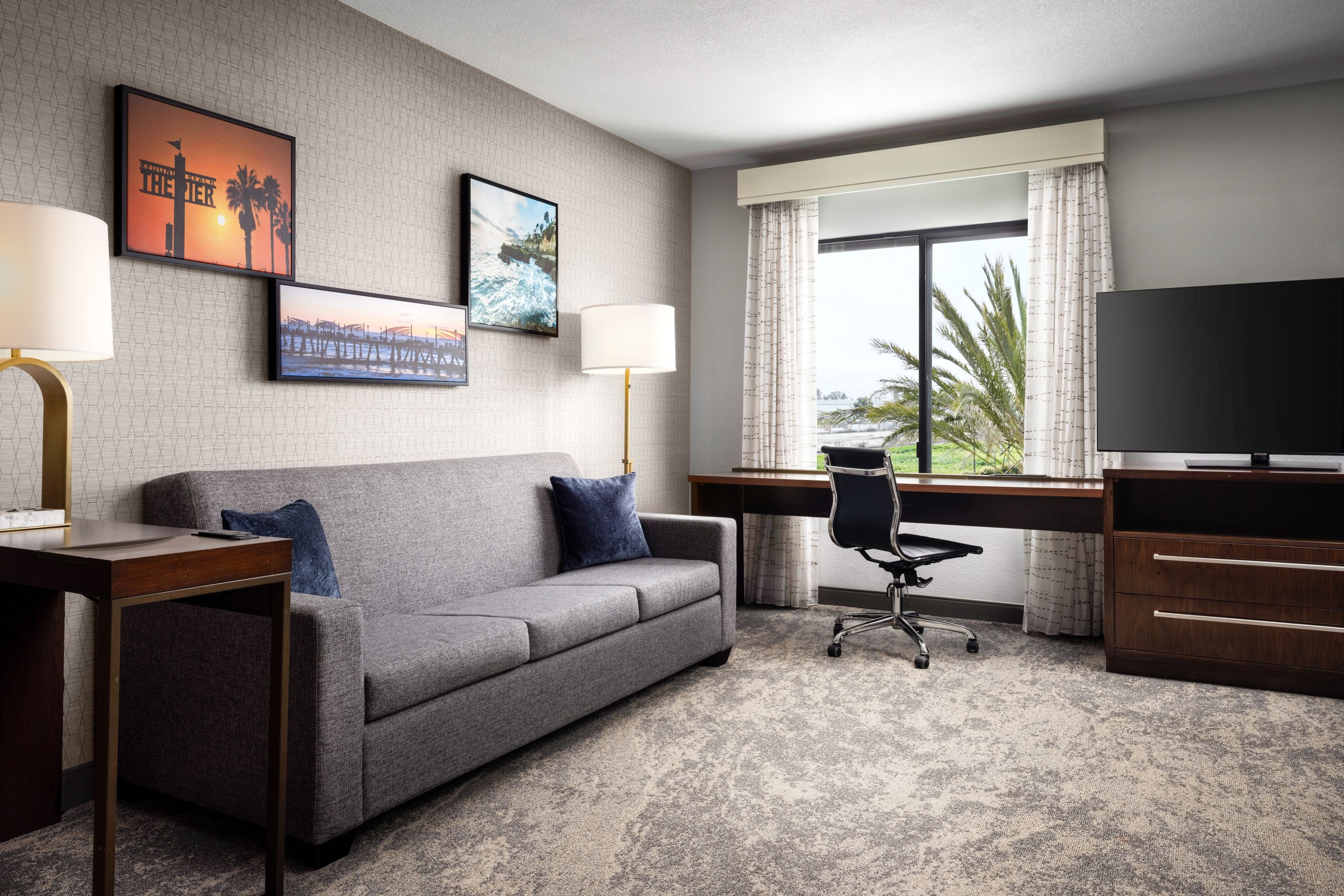 Residence Inn by Marriott Redondo Beach-guestroom-One-Bedroom King Suite - Living Area.jpg