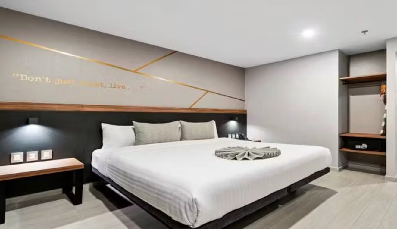 BEDFORD HOTEL-guestroom-Deluxe King Bed.jpg