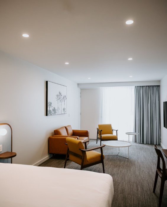 PENINSULA HOTEL MOTEL-guestroom-First Level Deluxe King Room.jpg