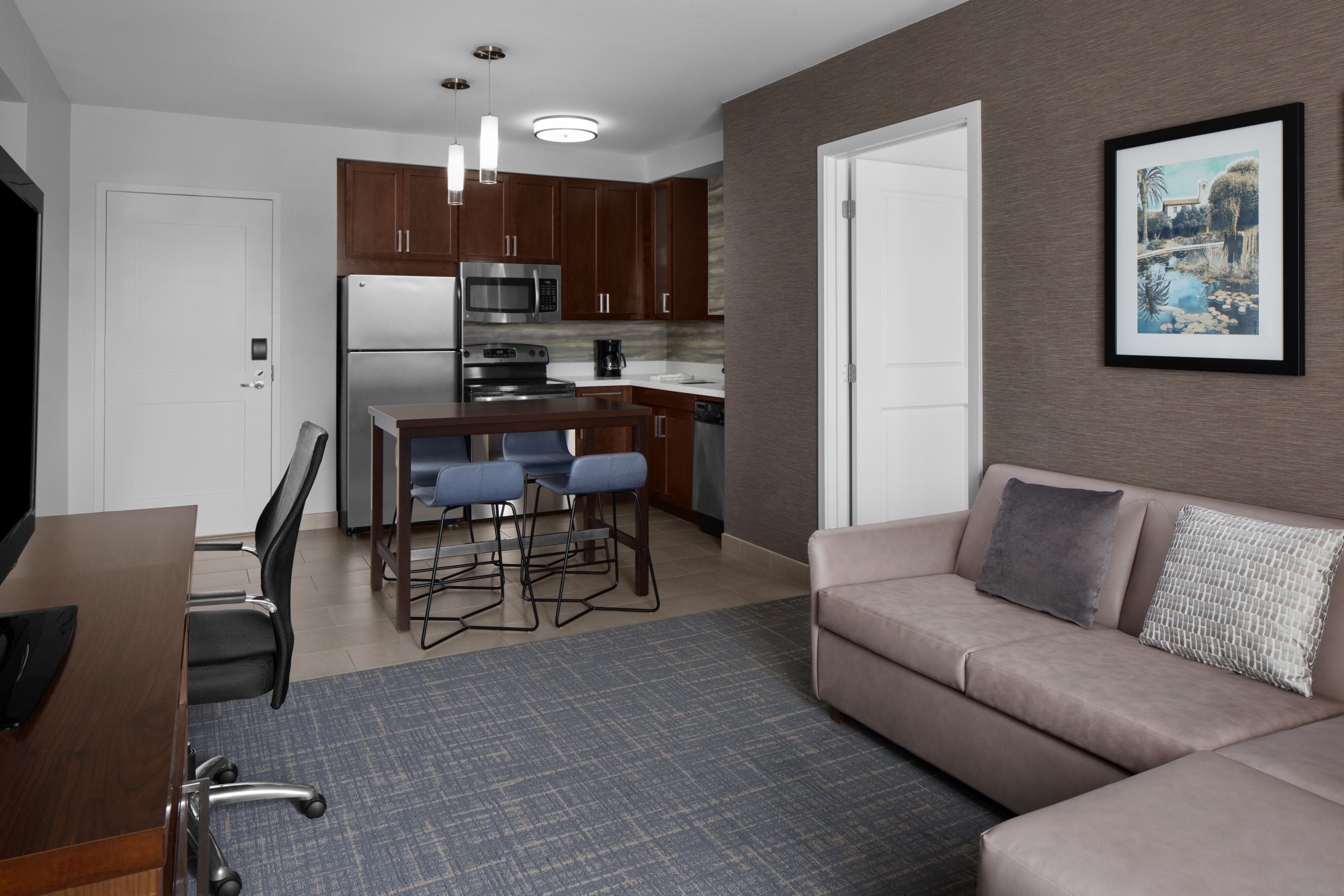 Residence Inn by Marriott Tustin Orange County-guestroom-Living Area.jpg