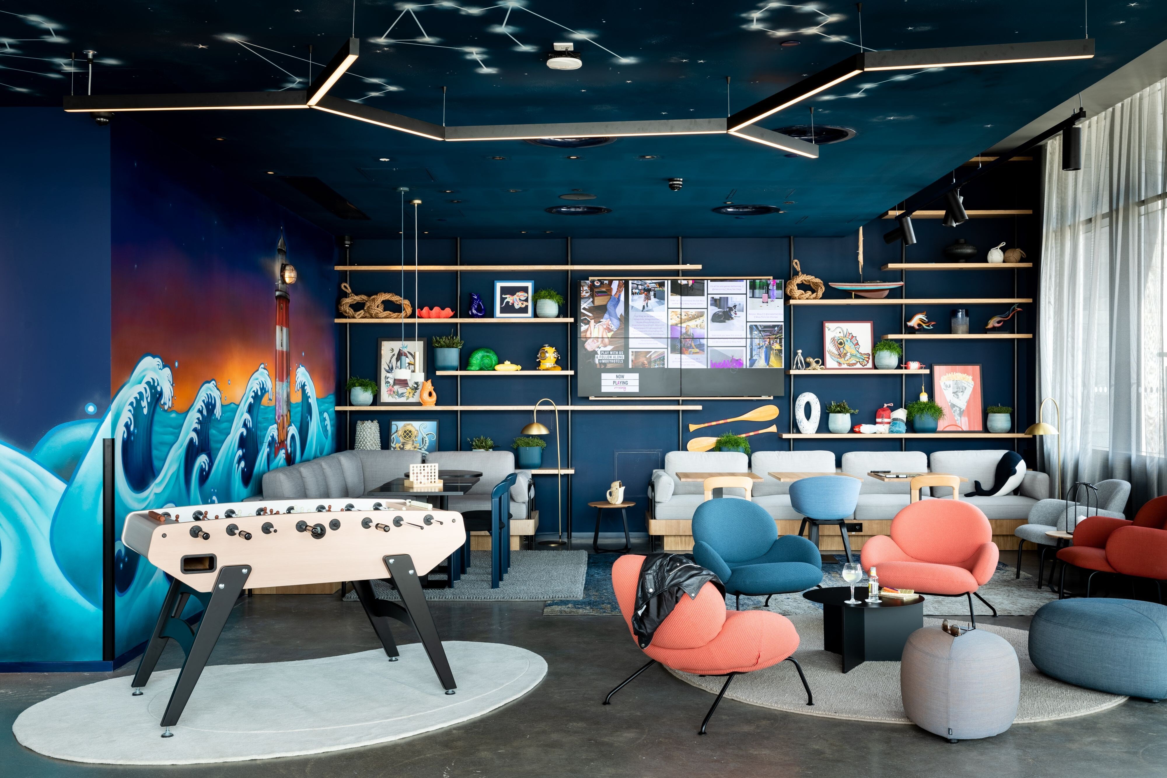 Moxy Plymouth-guestroom-Living Room and games area.jpg