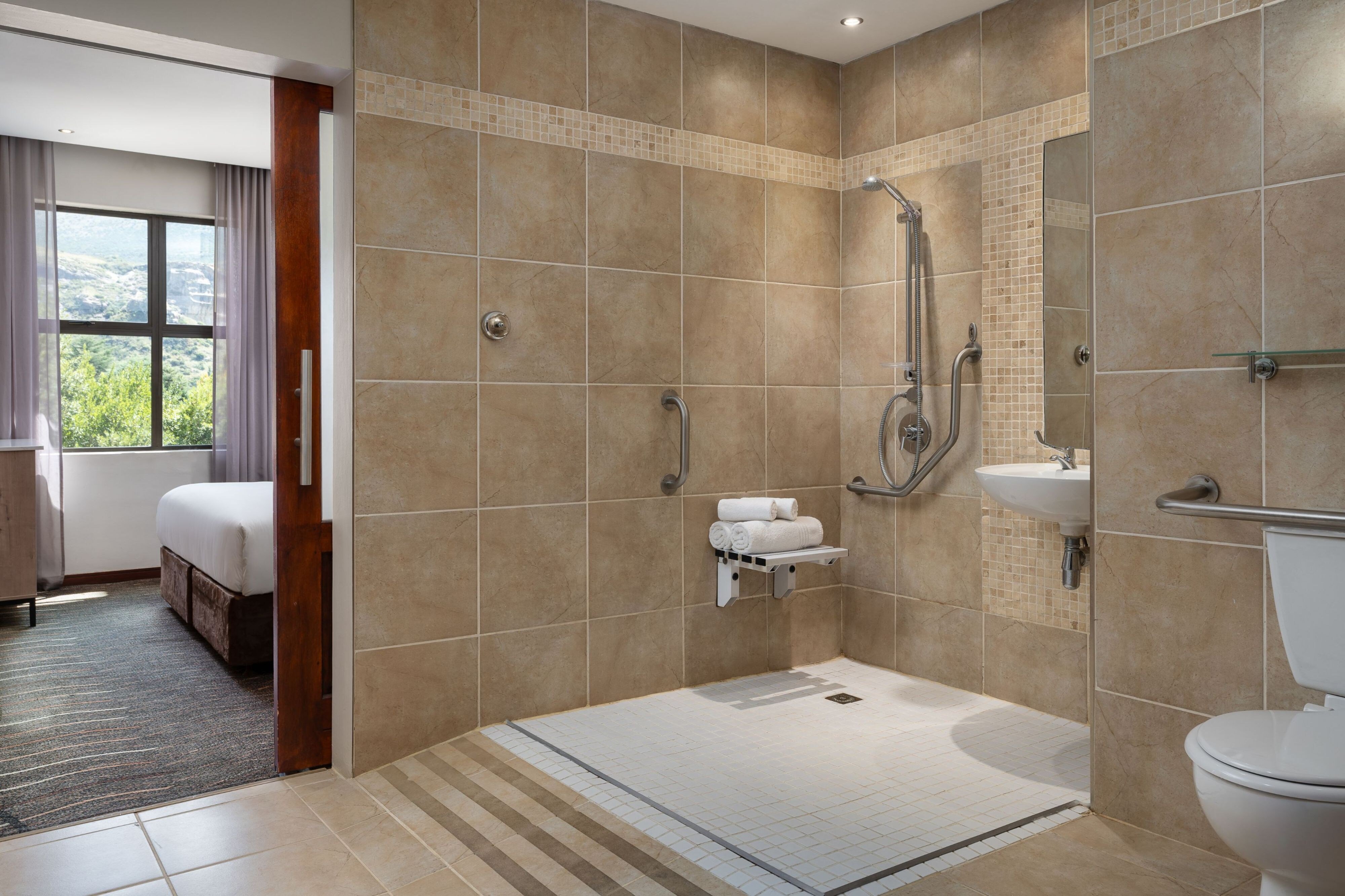 Protea Hotel by Marriott Clarens-guestroom-Accessible Shower.jpg