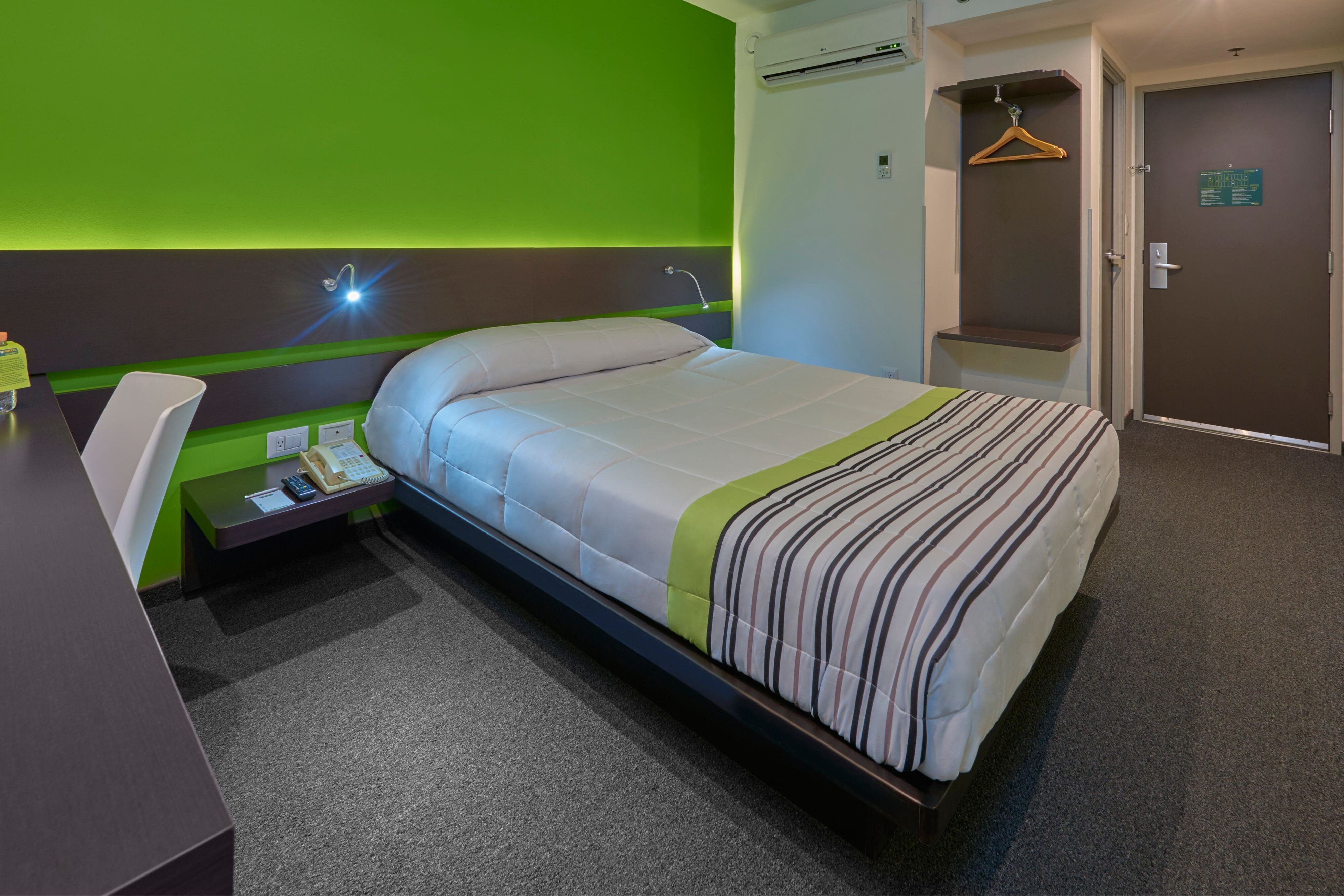 City Express Junior by Marriott Puebla Finsa-guestroom-Bedroom.jpg