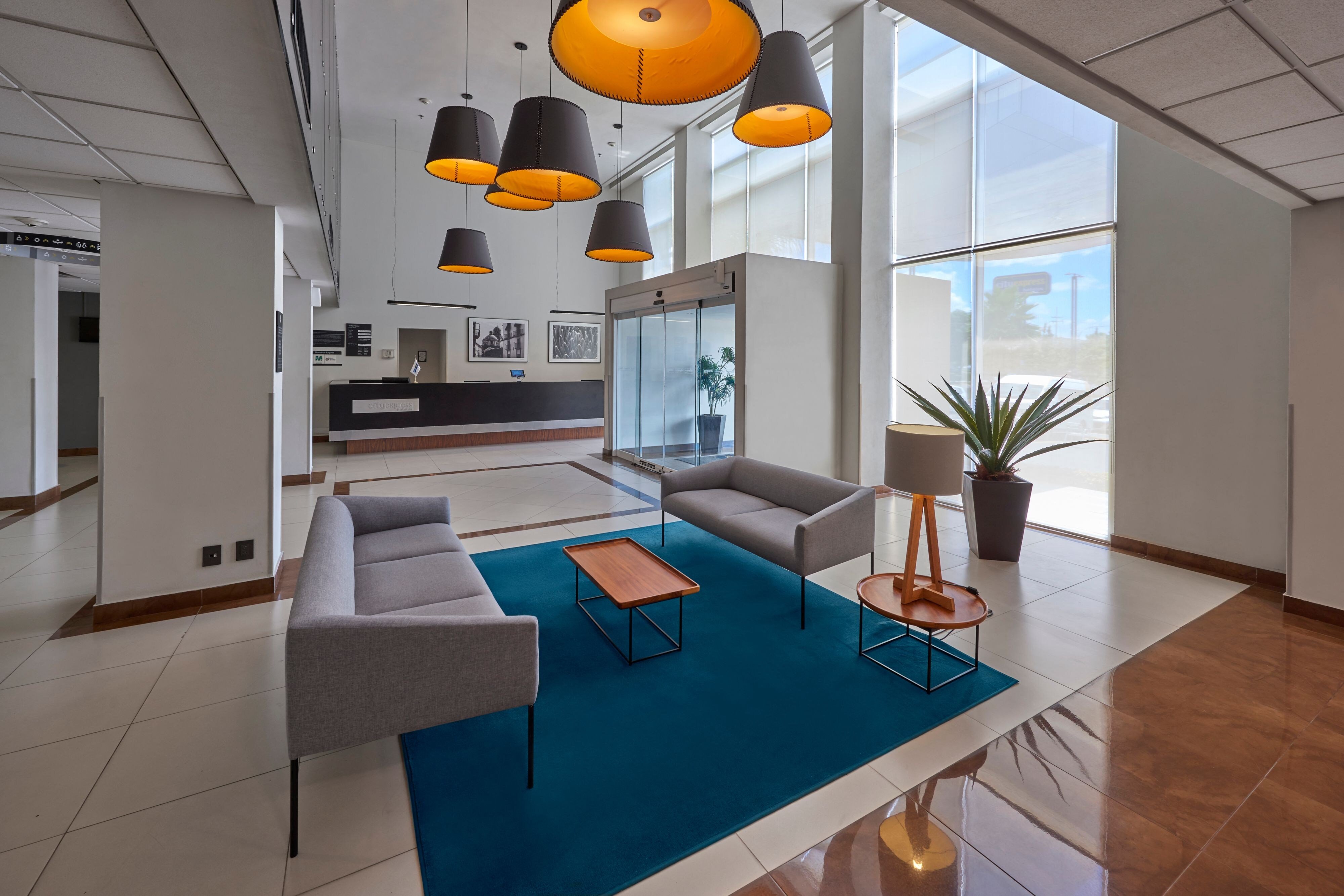 City Express by Marriott Queretaro Jurica-guestroom-Living Area.jpg