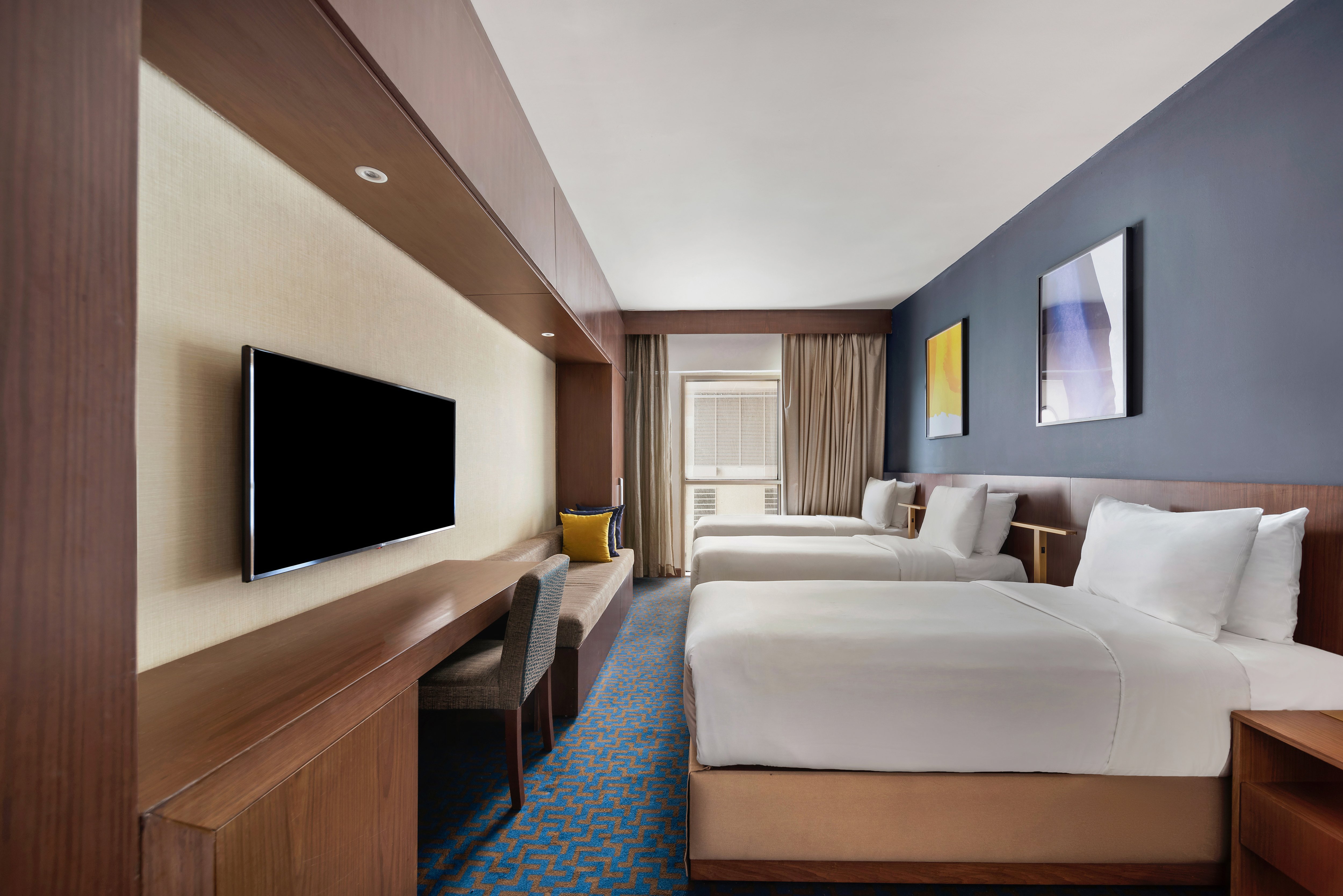 VOCO MAKKAH BY IHG-guestroom-Drift into serenity in voco Makkah’s plush triple rooms.jpg