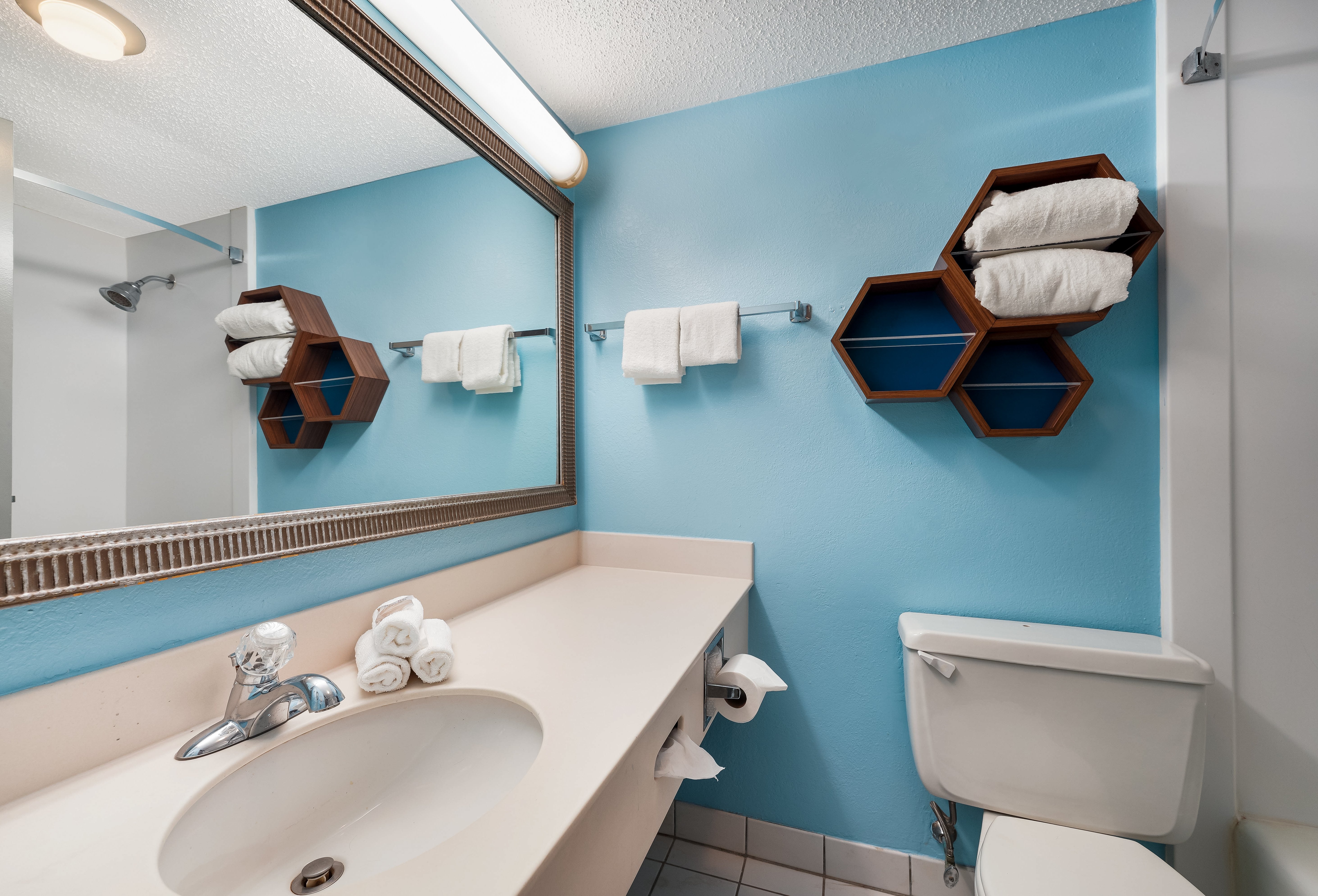 HOMETOWNE STUDIOS PAINTED POST-guestroom-Studio Full Bath.jpg