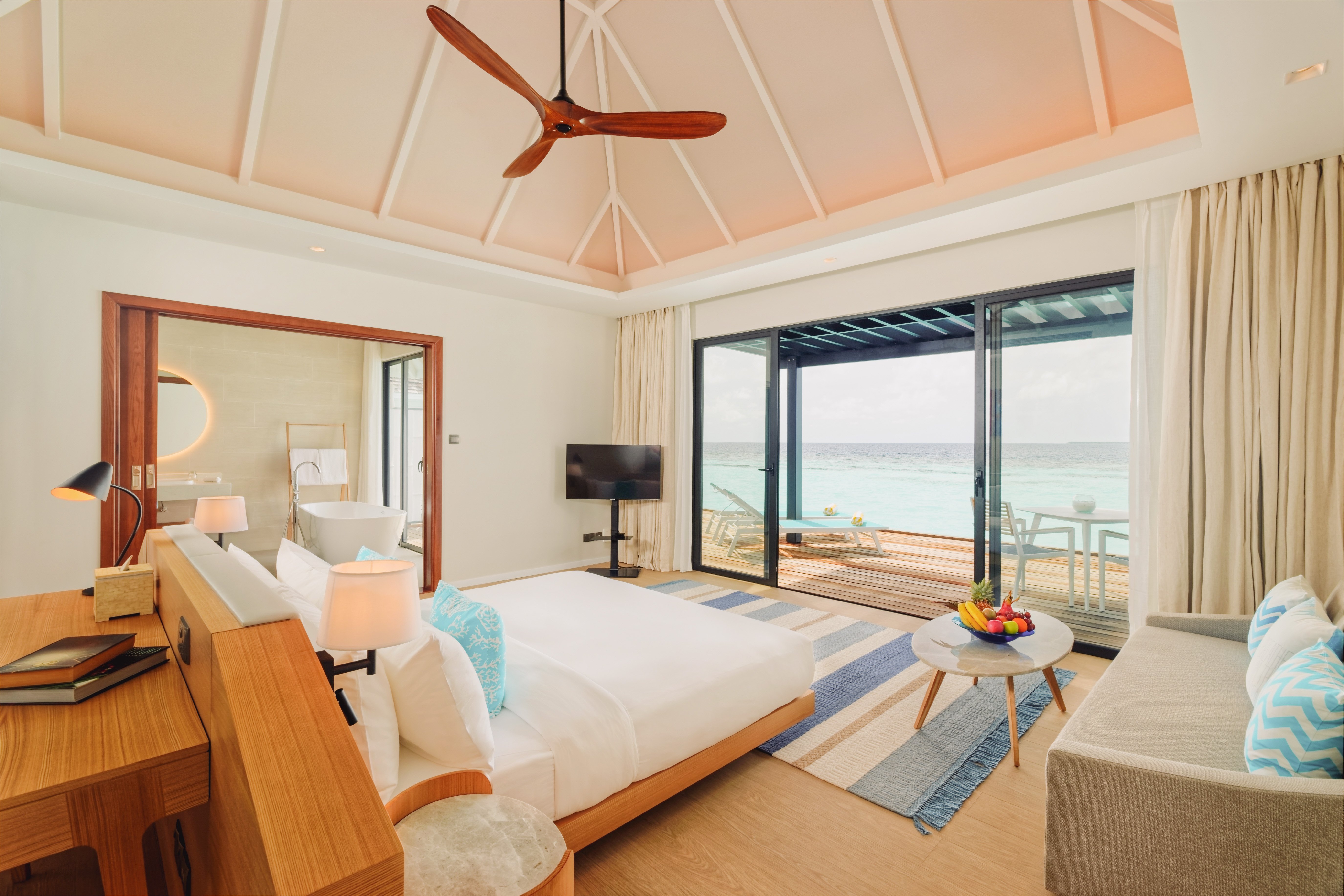NOVA Maldives-guestroom-Water Villa with Jacuzzi - Bedroom.jpg