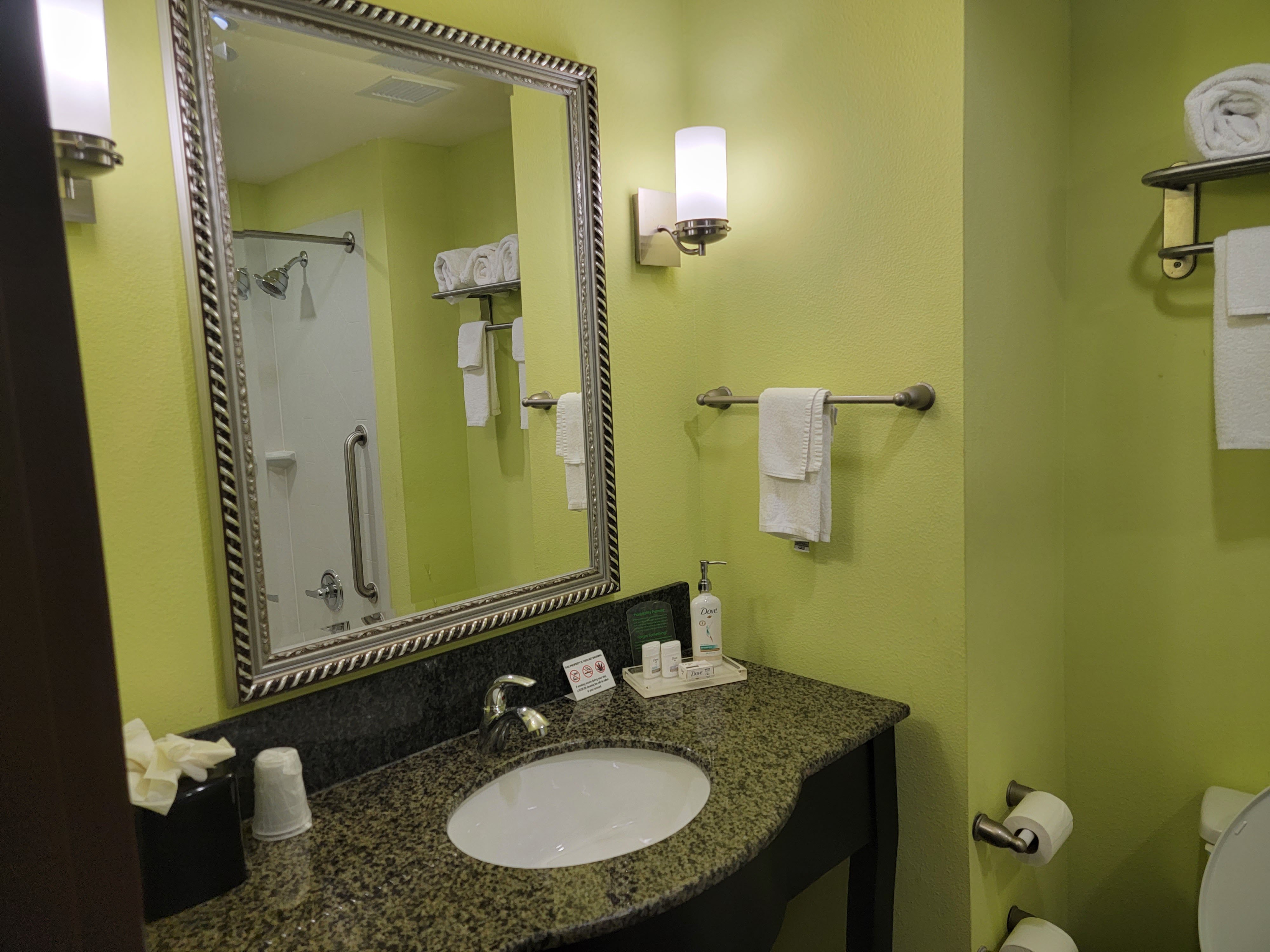 HOLIDAY INN GARLAND BY IHG-guestroom-Junior Suite Bath- 1 king bed - 1 pullout sofa - 2 TV.jpg