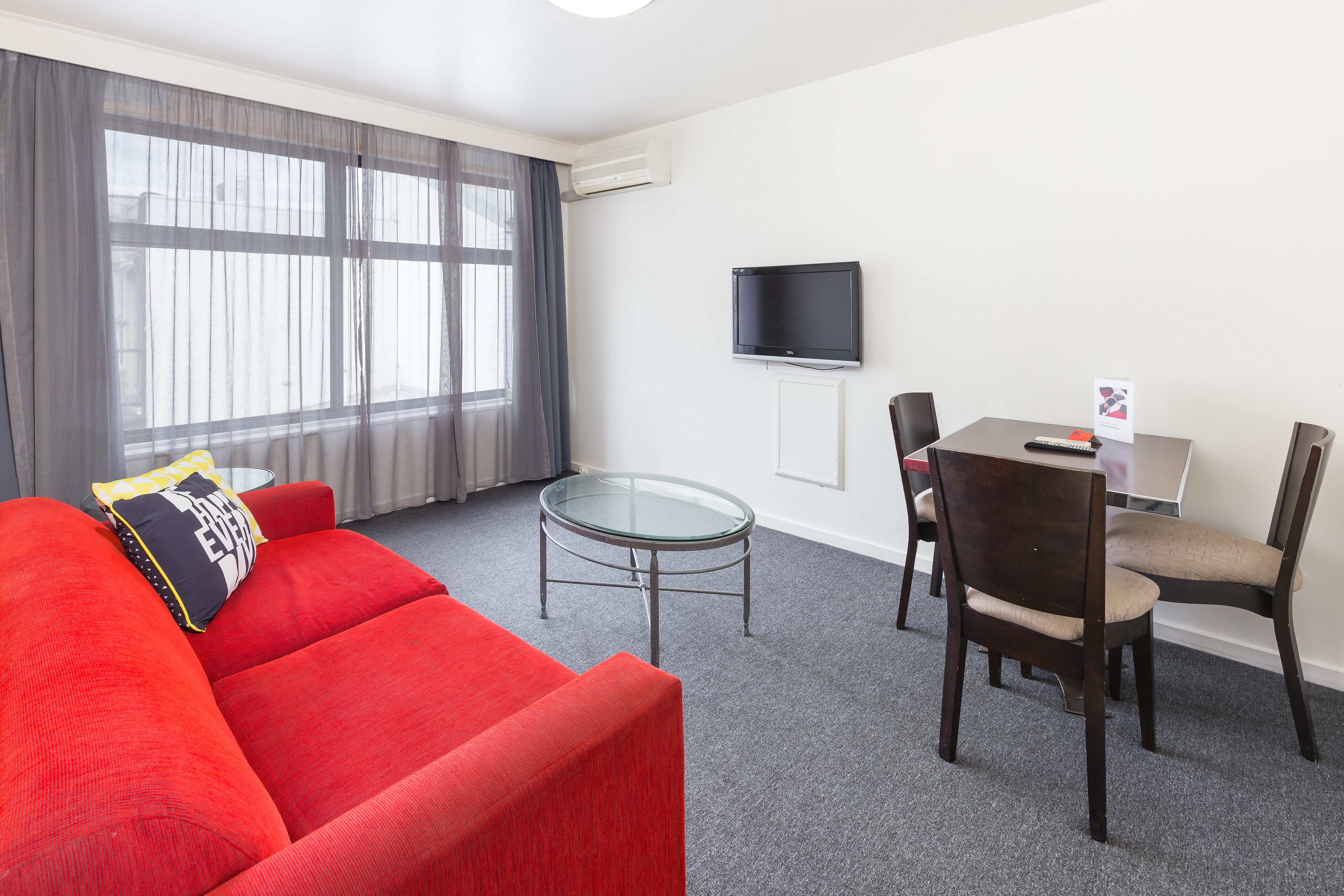 CITY EDGE SERVICED APARTMENTS-guestroom-Gipps One Bedroom Living Room.jpg