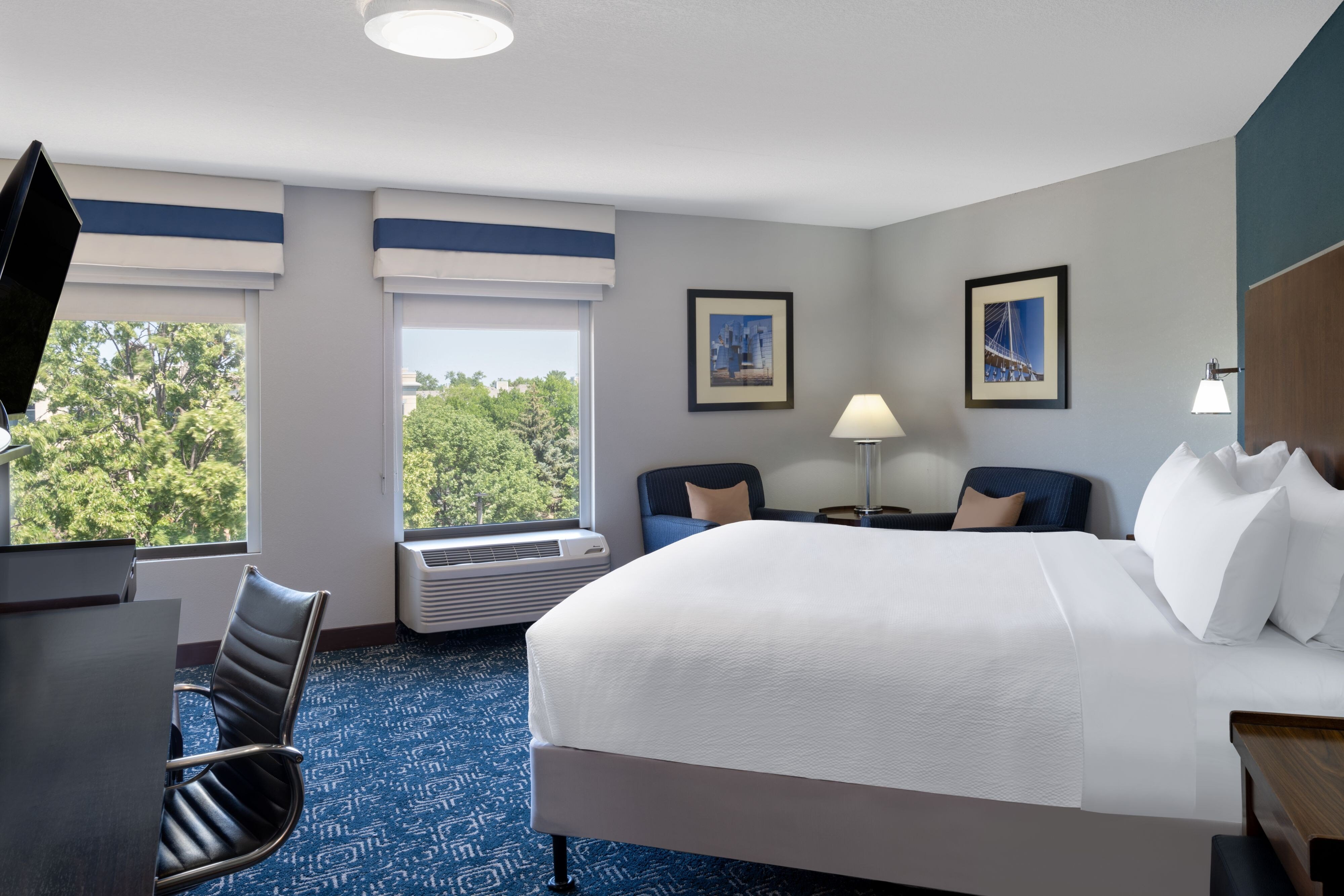 Four Points by Sheraton Mall of America Minneapolis Airport-guestroom-Corner King Suite.jpg