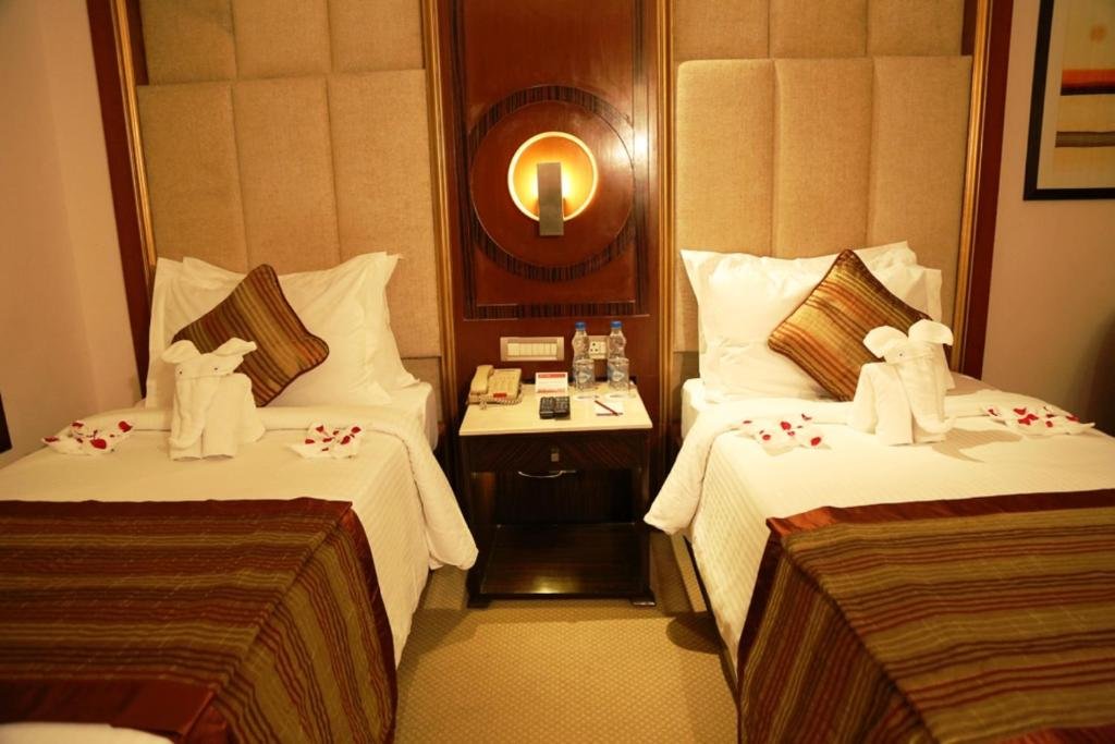 THE ACURA BMK-guestroom-Deluxe.jpg