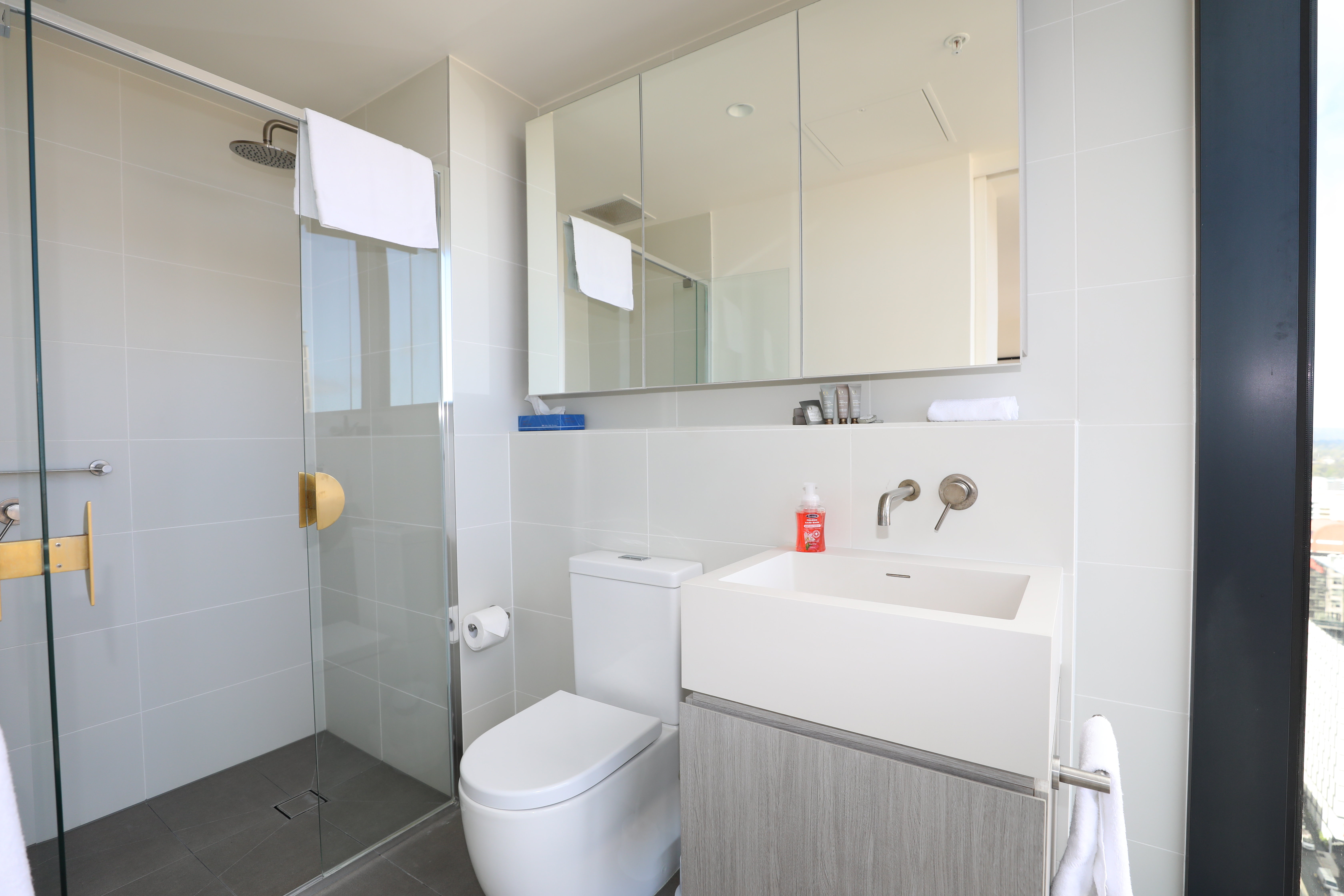 Realm Apartments by CLLIX-guestroom-Two Bedroom Two Bathroom Apartment - Bathroom.jpg