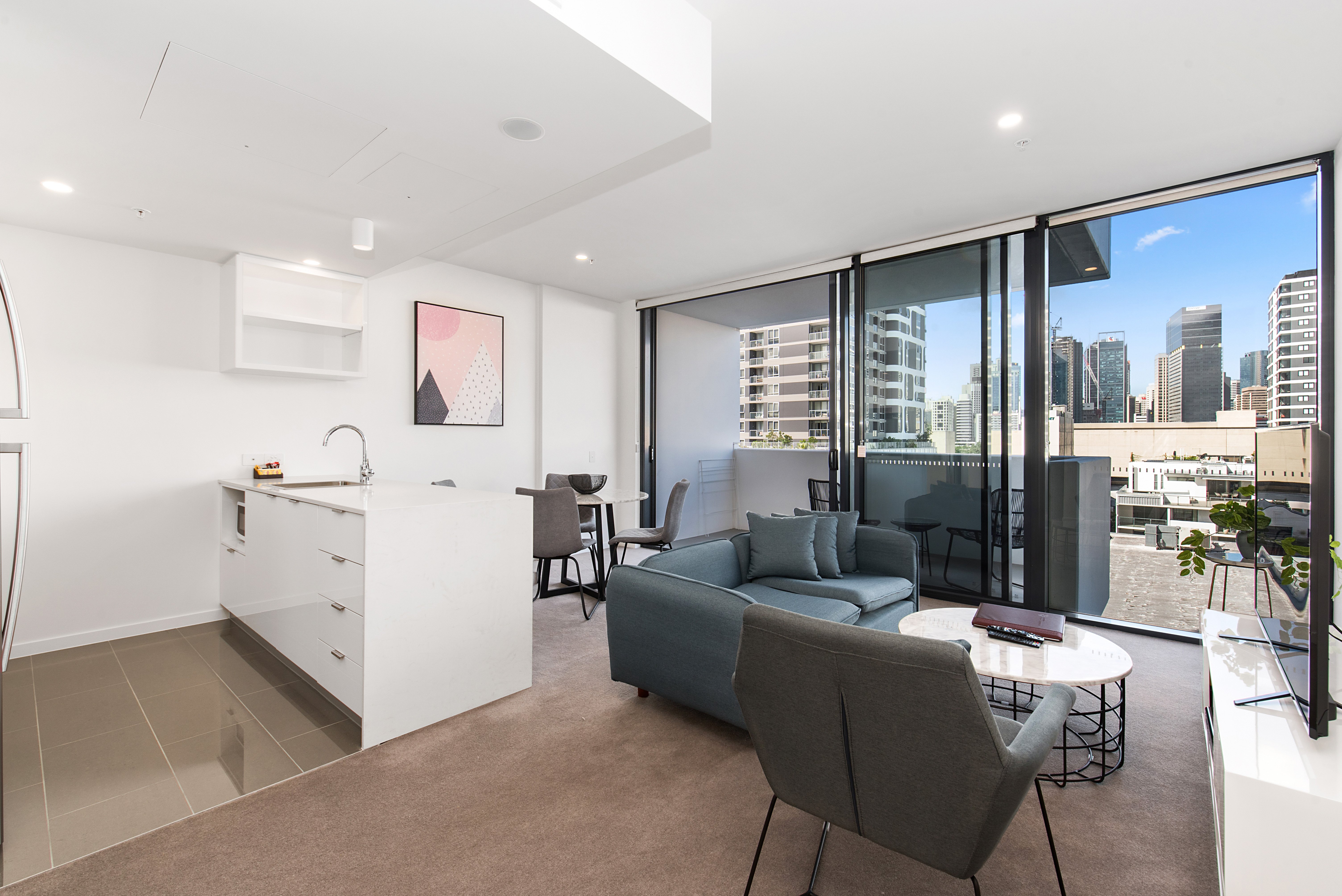 IVY EVE APARTMENTS BY CLLIX-guestroom-Two Bedroom Two Bathroom Apartment - Living Area.jpg