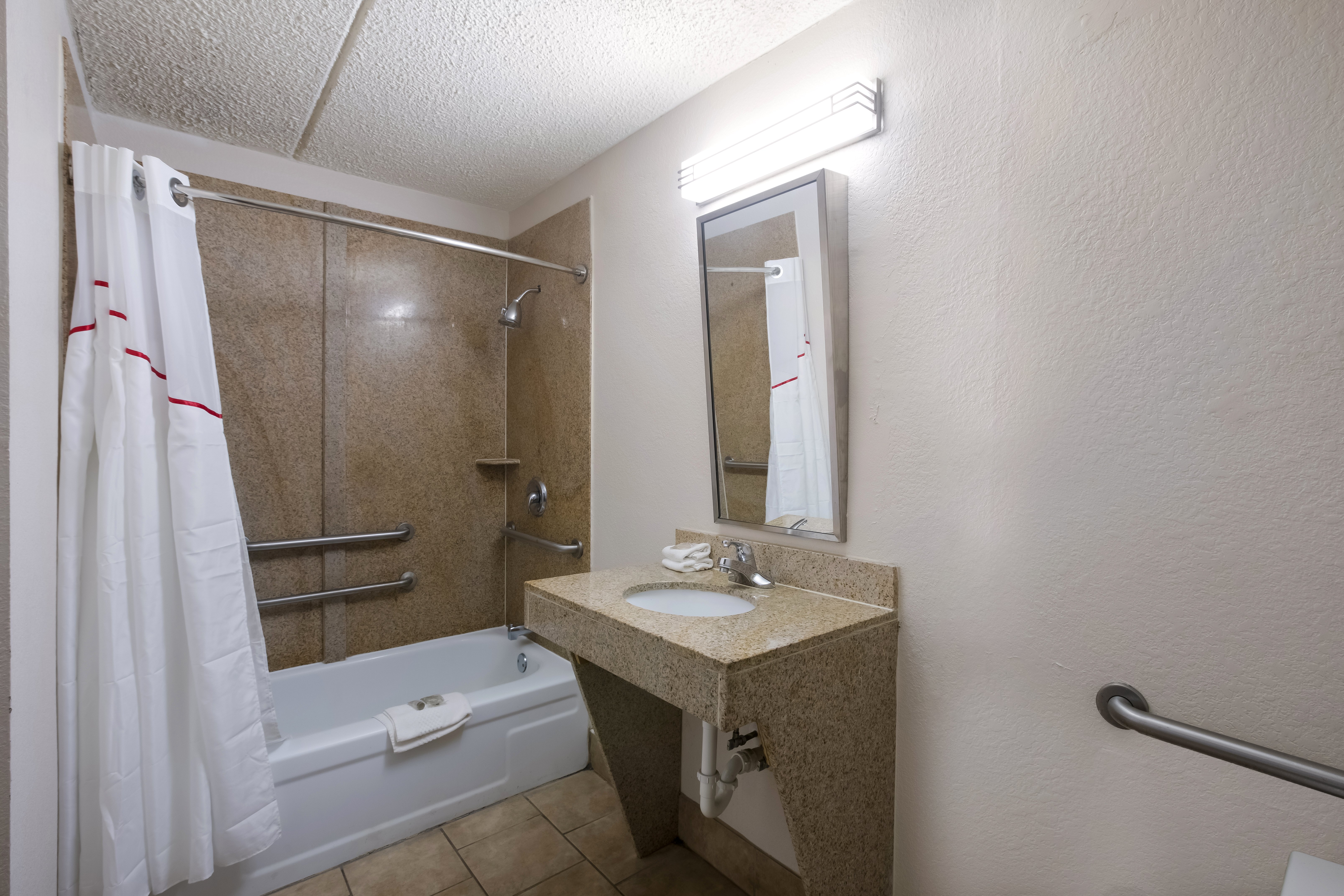 RED ROOF ATLANTA AIRPORT NE - C-guestroom-ADA Bath.jpg