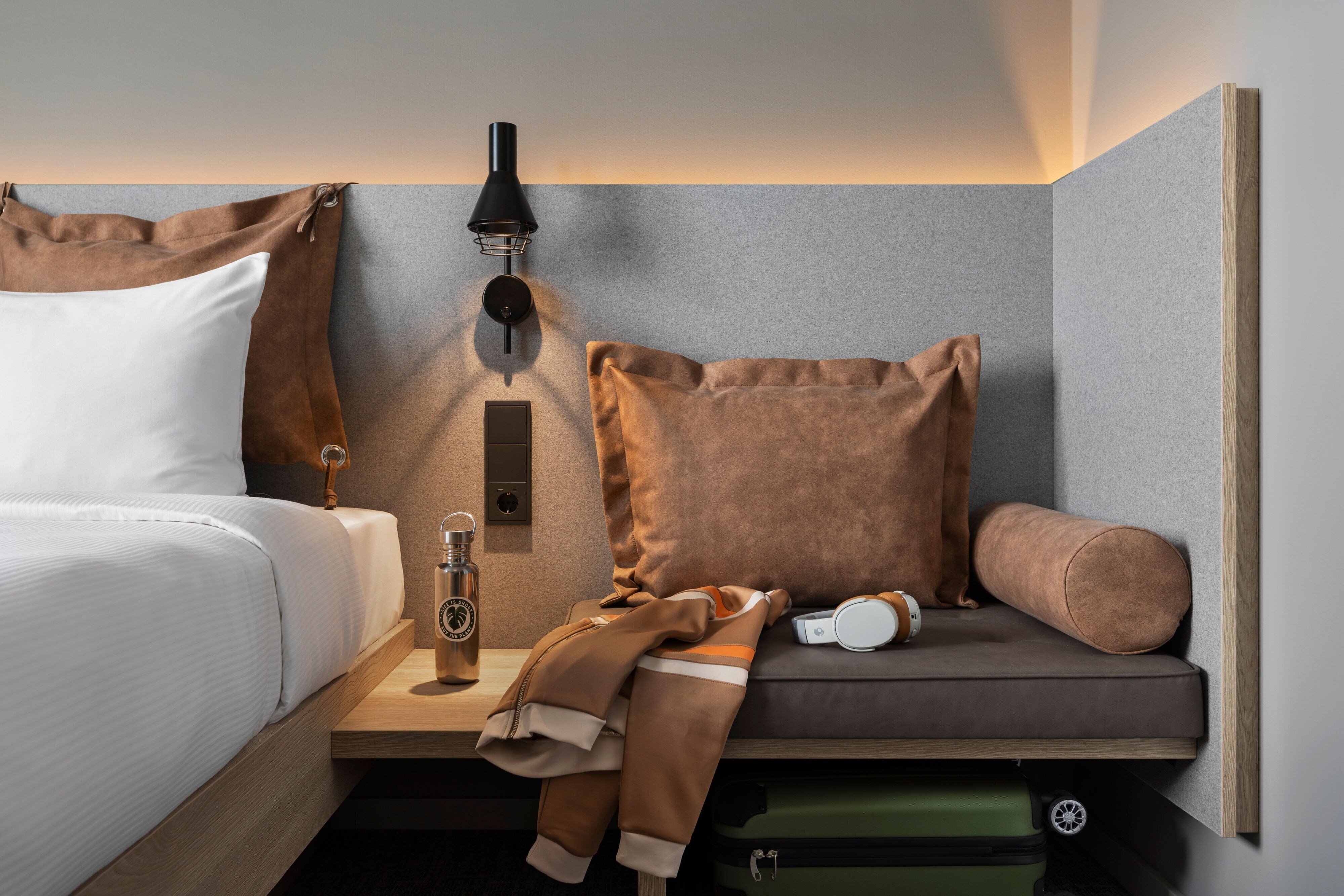 Moxy Vienna City East-guestroom-Queen Sitting Area.jpg