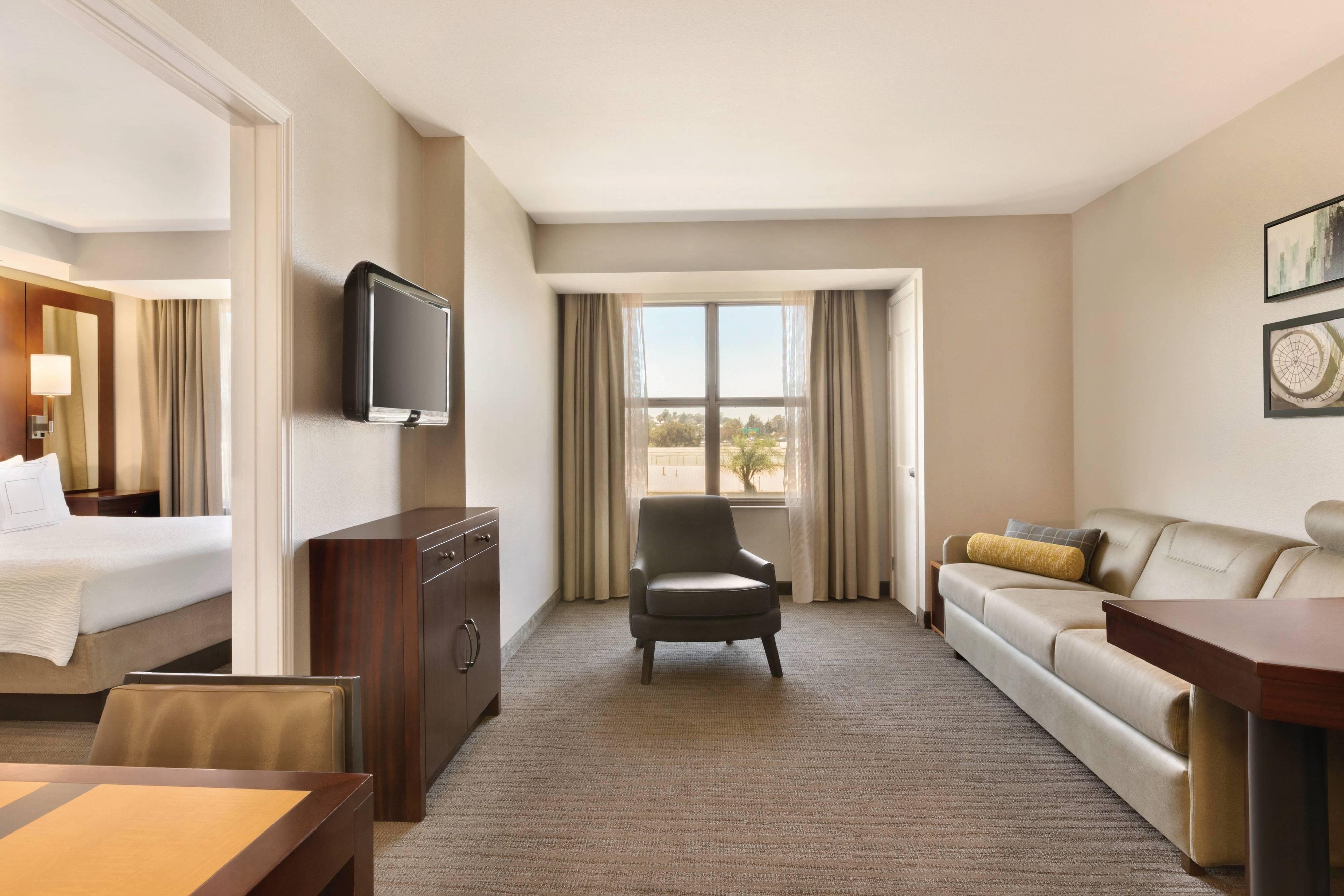 Residence Inn by Marriott San Diego North-San Marcos-guestroom-King Suite - Living Area.jpg