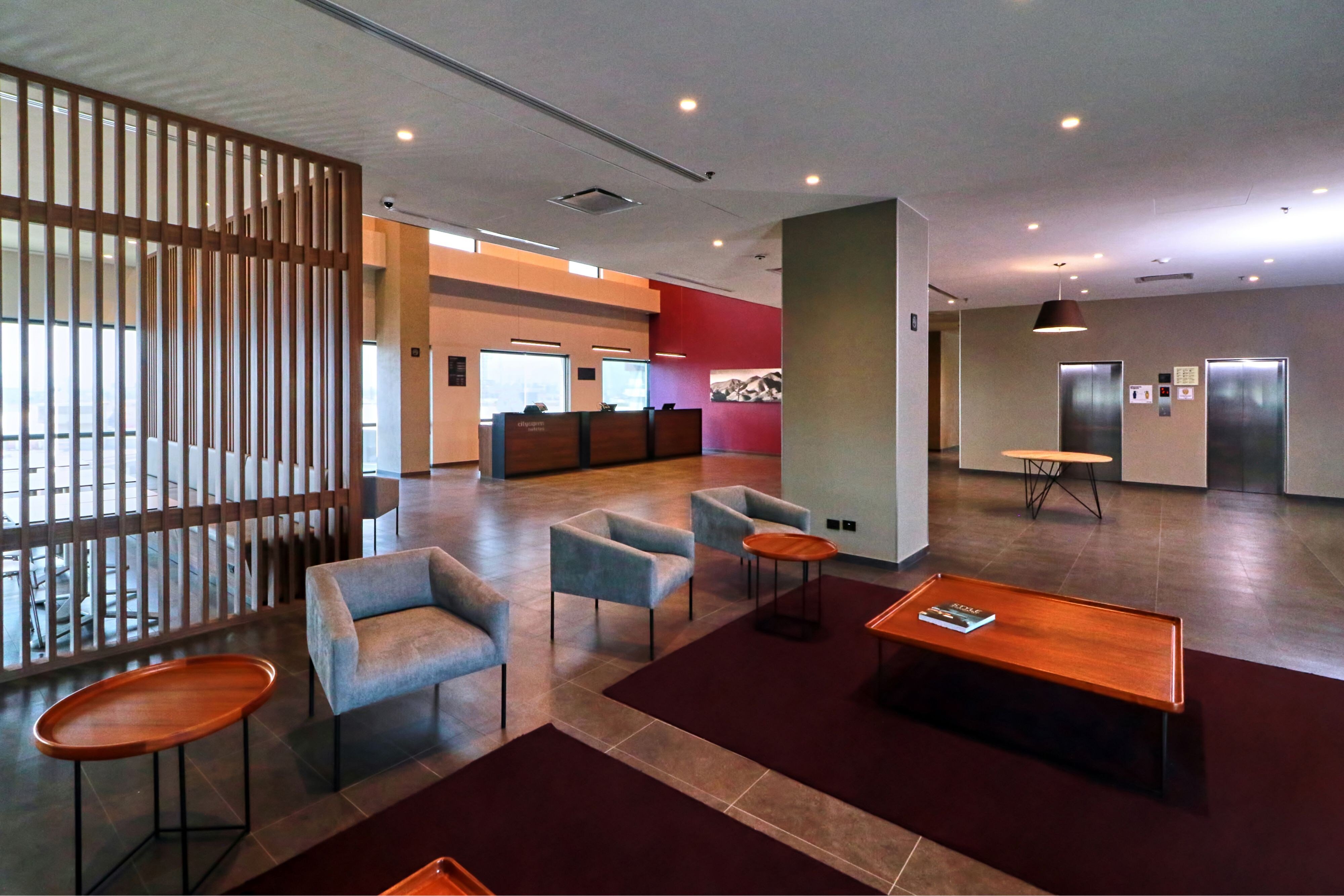 City Express by Marriott Monterrey Universidad-guestroom-Living Area.jpg