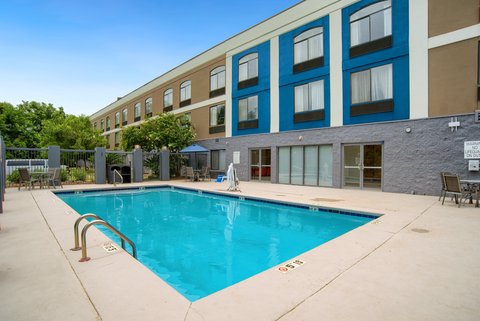 Enjoy a refreshing swim in the inviting pool.