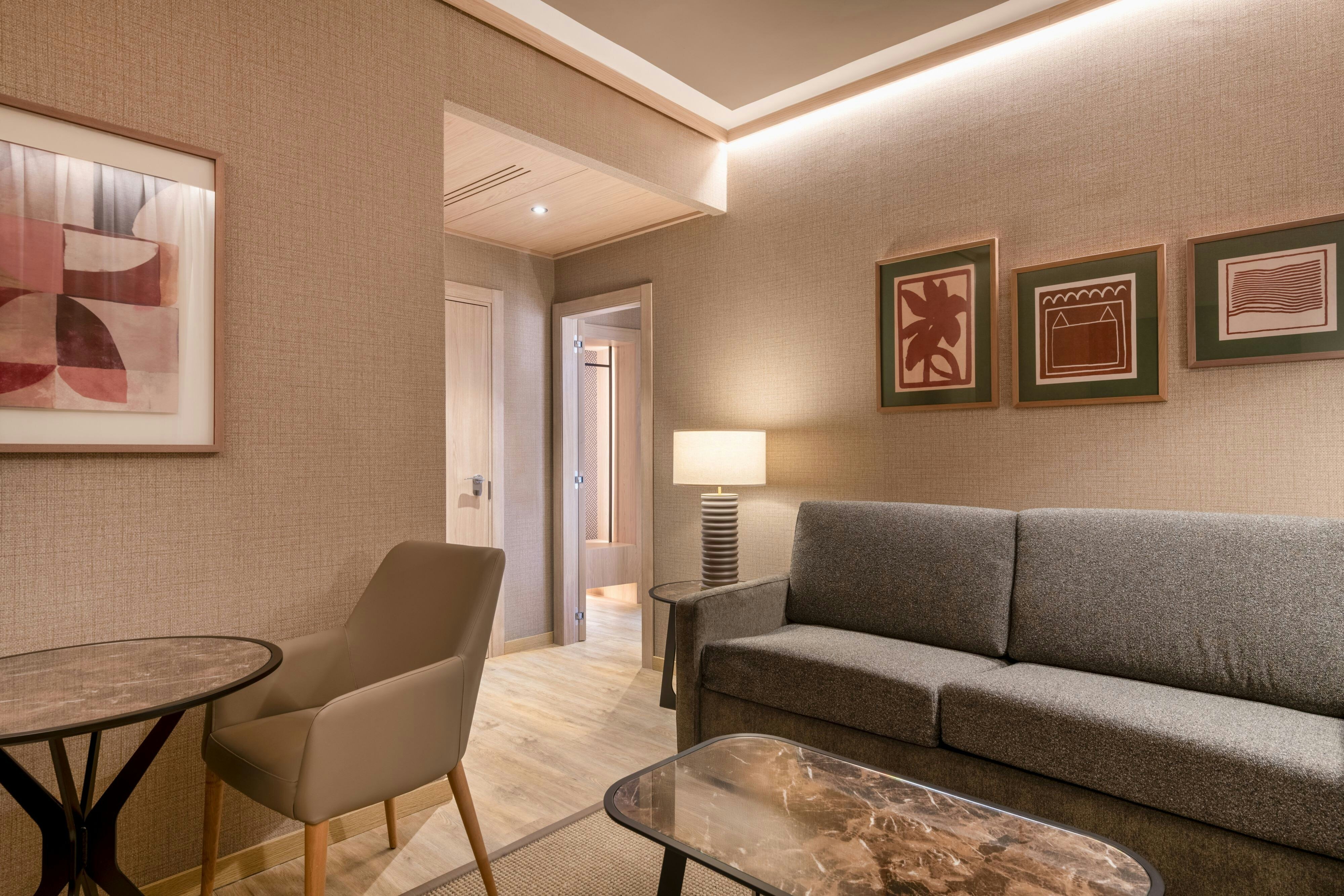 AC Hotels by Marriott Cartagena-guestroom-Junior Suite Living Area.jpg