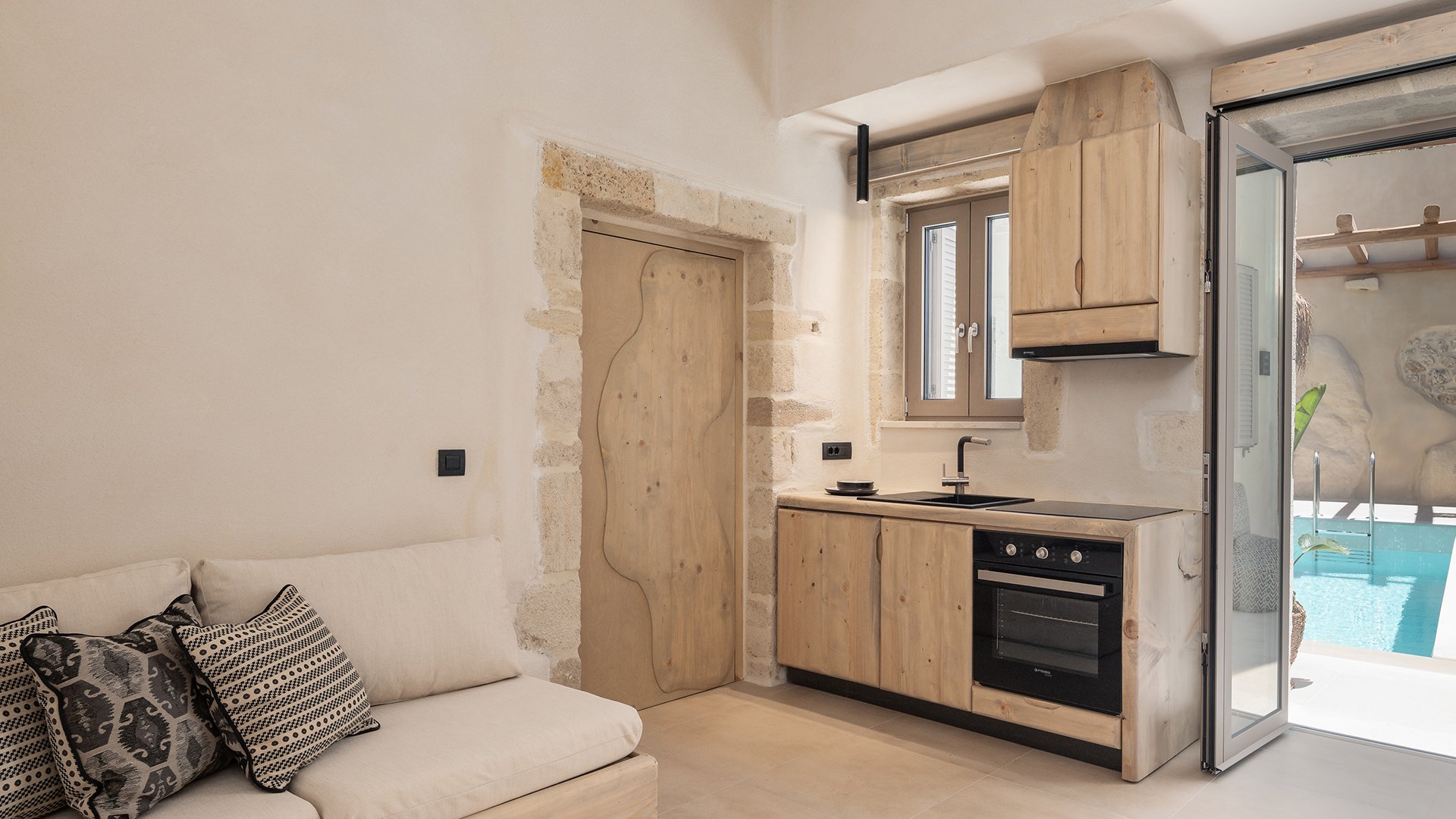Manili Boutique Suites-guestroom-Deluxe Suite - Living Area & Kitchenette.jpg