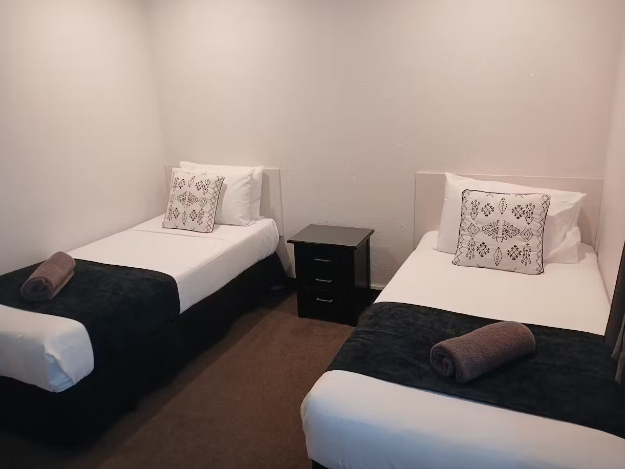 Palm City Motor Inn-guestroom-One Bedroom Suite.jpg