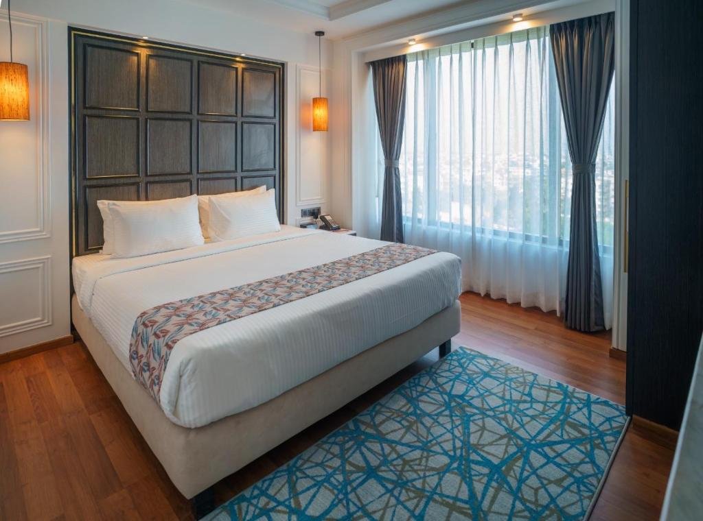 HOTEL SOOT-guestroom-Hotel Soot Premium Suite Bedroom.jpg