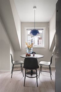 Tromso Apartments by First-guestroom-Kitchen Table 2-bedroom-apartment-enter-apartments.jpg
