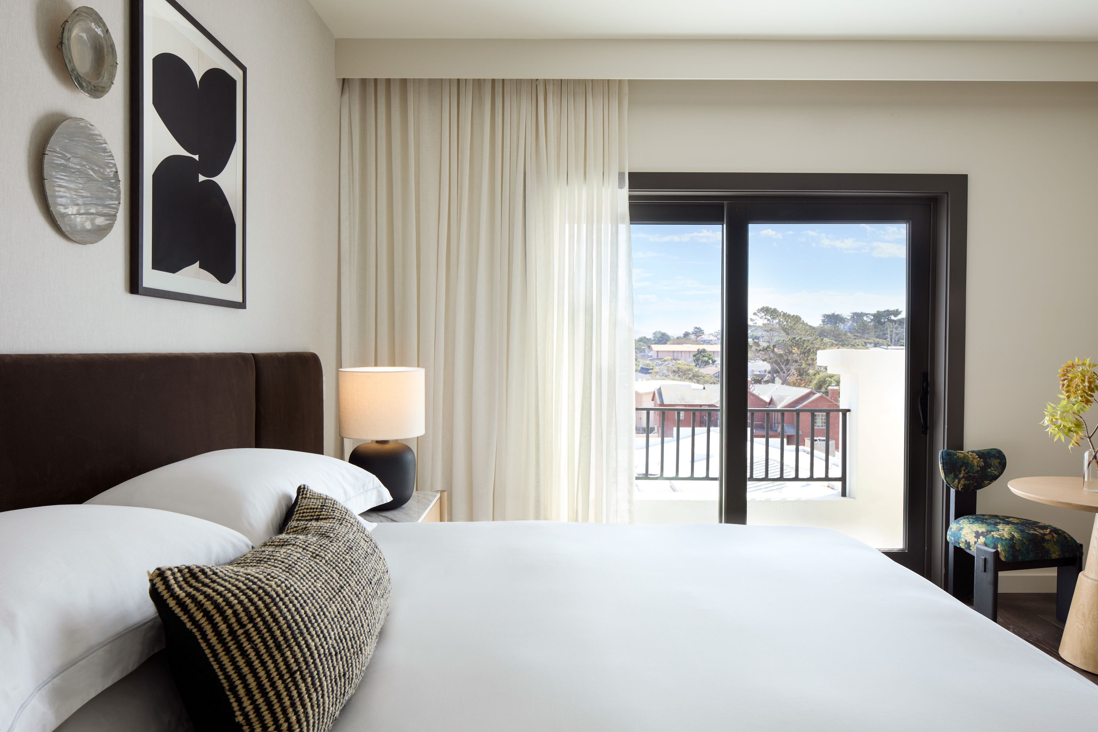 KIMPTON MIRADOR PACIFIC GROVE-guestroom-Elegant Pacific Grove guestroom with balcony and natural light..jpg