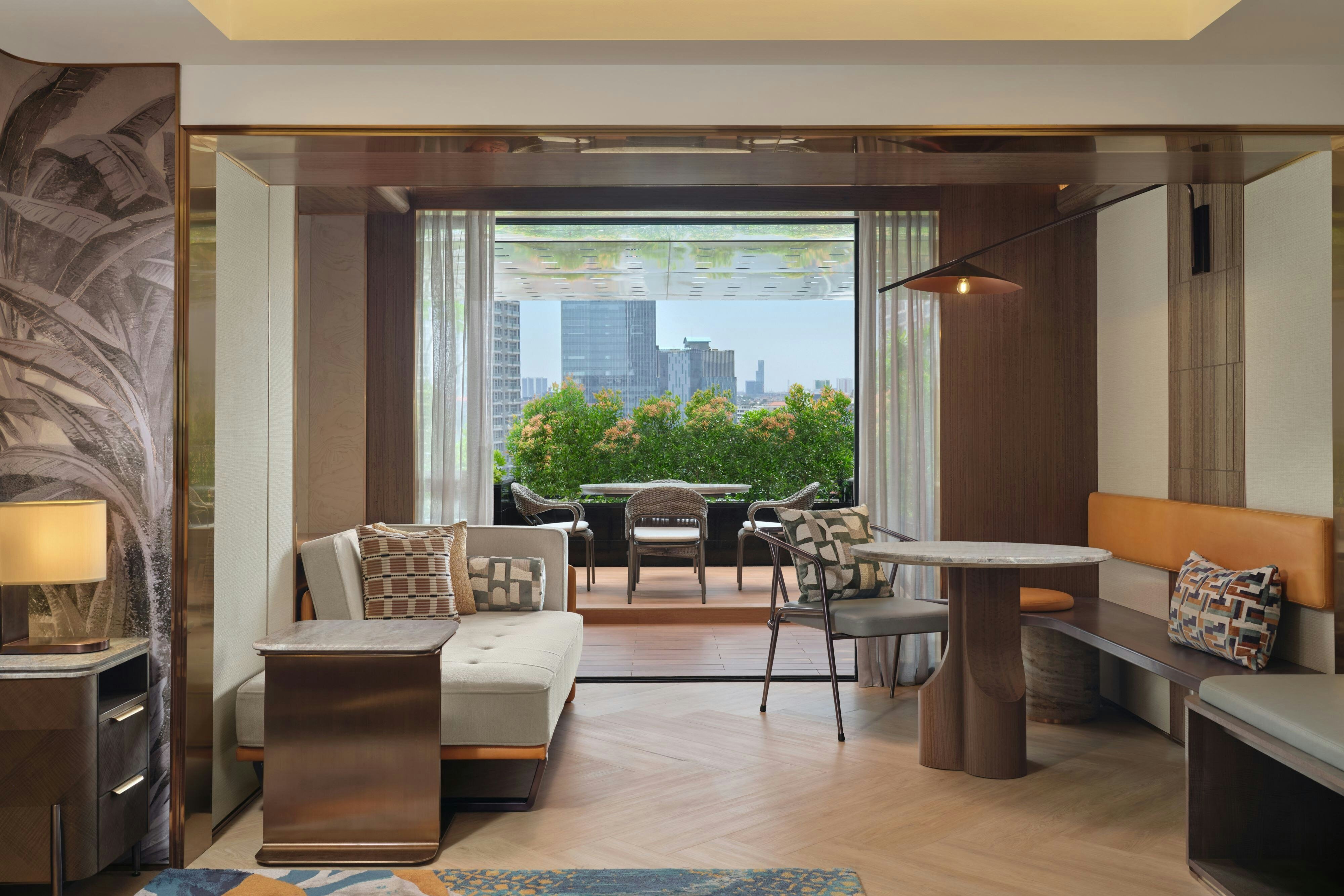 Sari Pacific Jakarta Autograph Collection-guestroom-Executive Terrace Club - Living Room.jpg