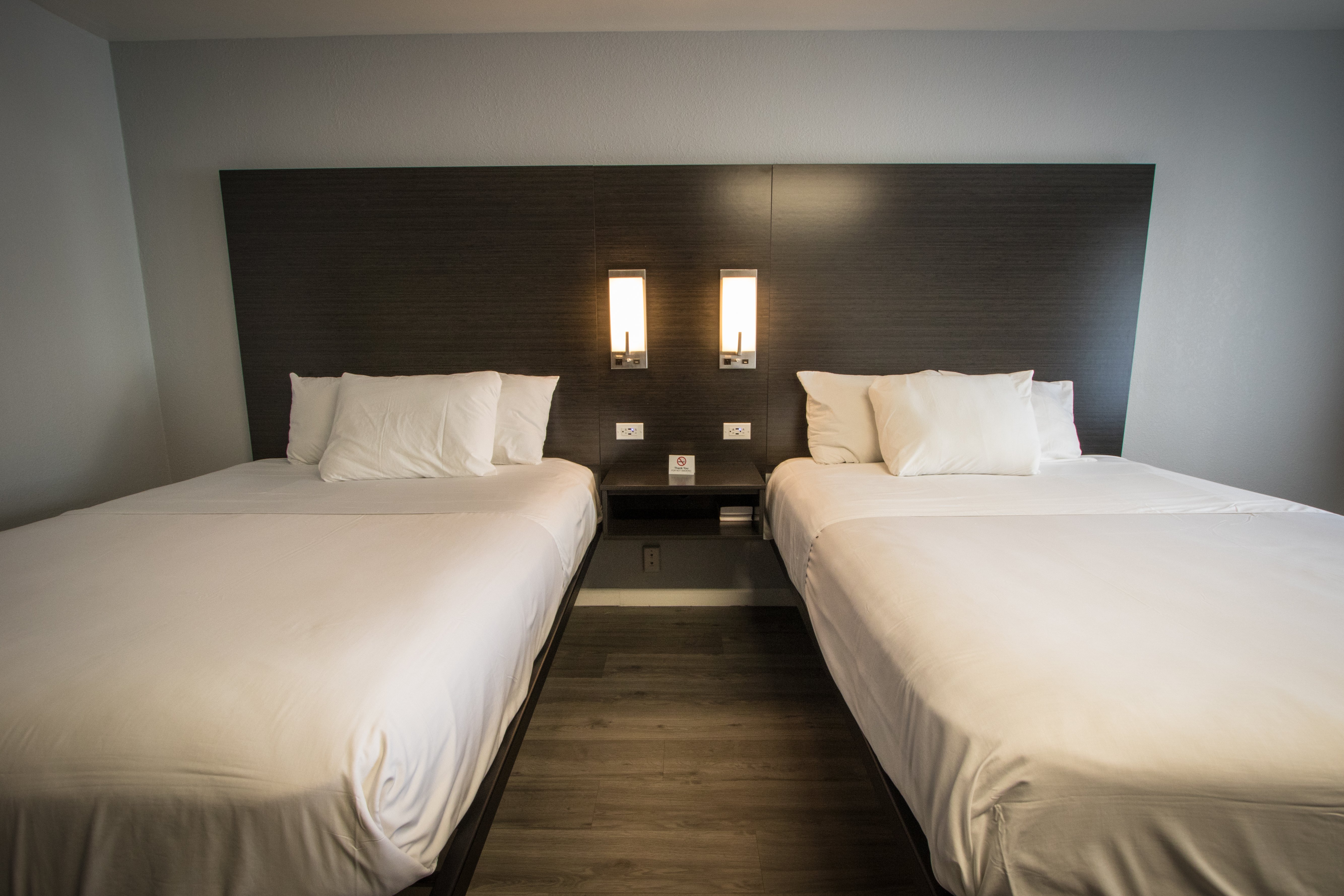 Envi Boutique Hotel-guestroom-Middle Of Beds.jpg