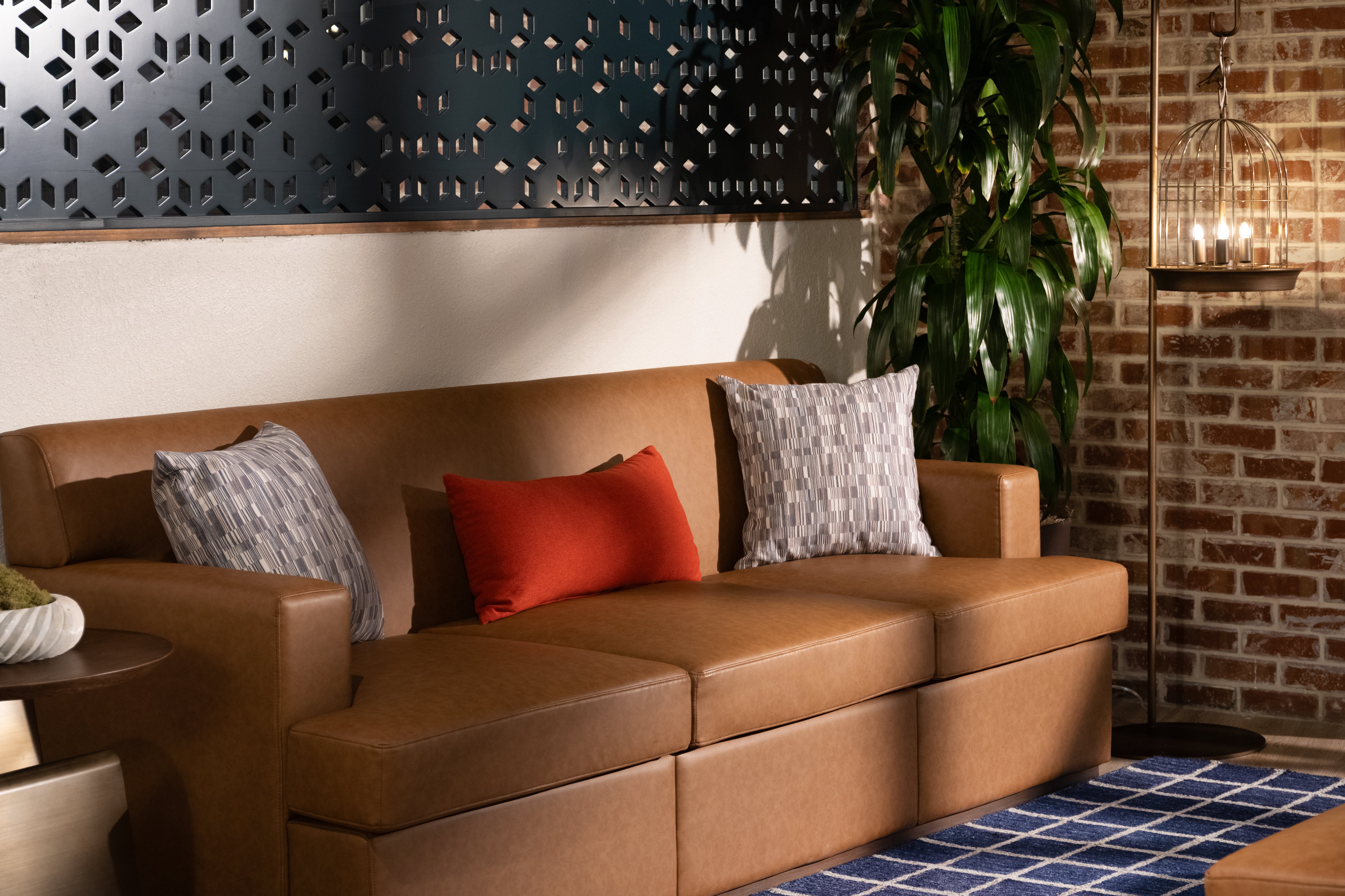 VOCO AGGIELAND BY IHG-guestroom-A welcoming seating area to start your College Station stay..jpg